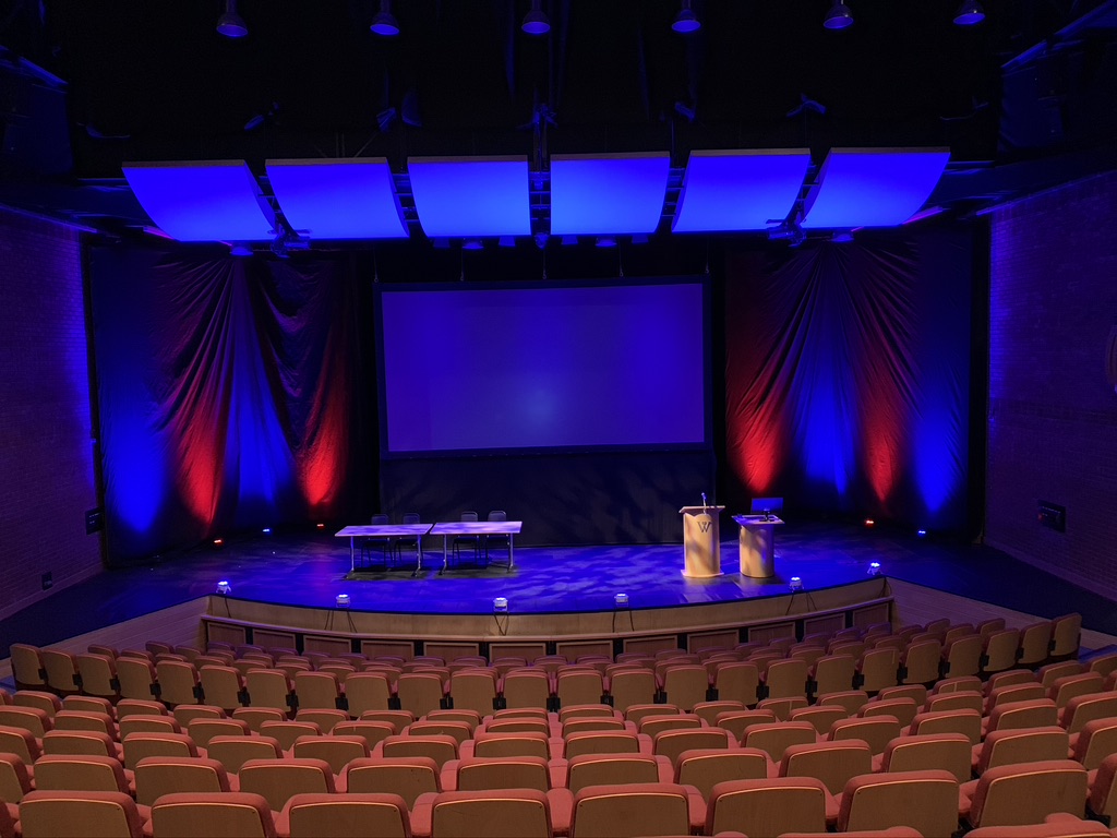 Marden Park Mansion event space with stage and professional lighting for conferences.