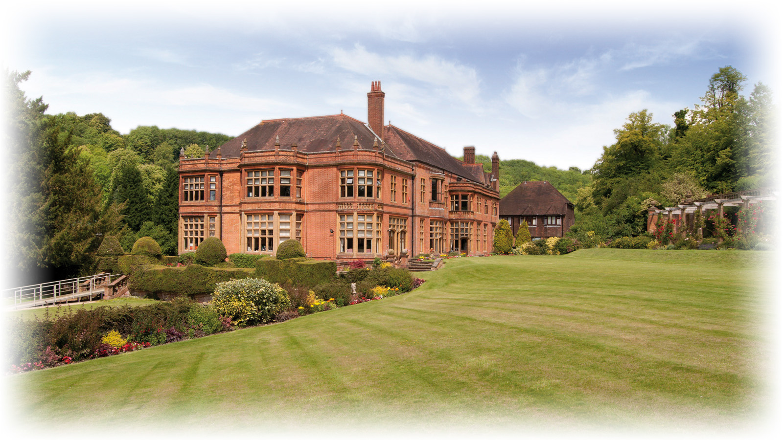 Marden Park Mansion: elegant venue for corporate retreats and weddings, surrounded by greenery.