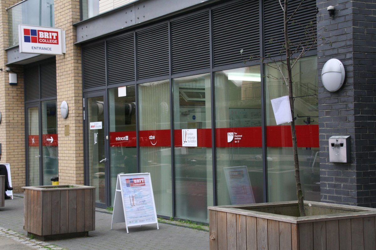 Modern Brit College in Limehouse with large glass windows, ideal for events and meetings.