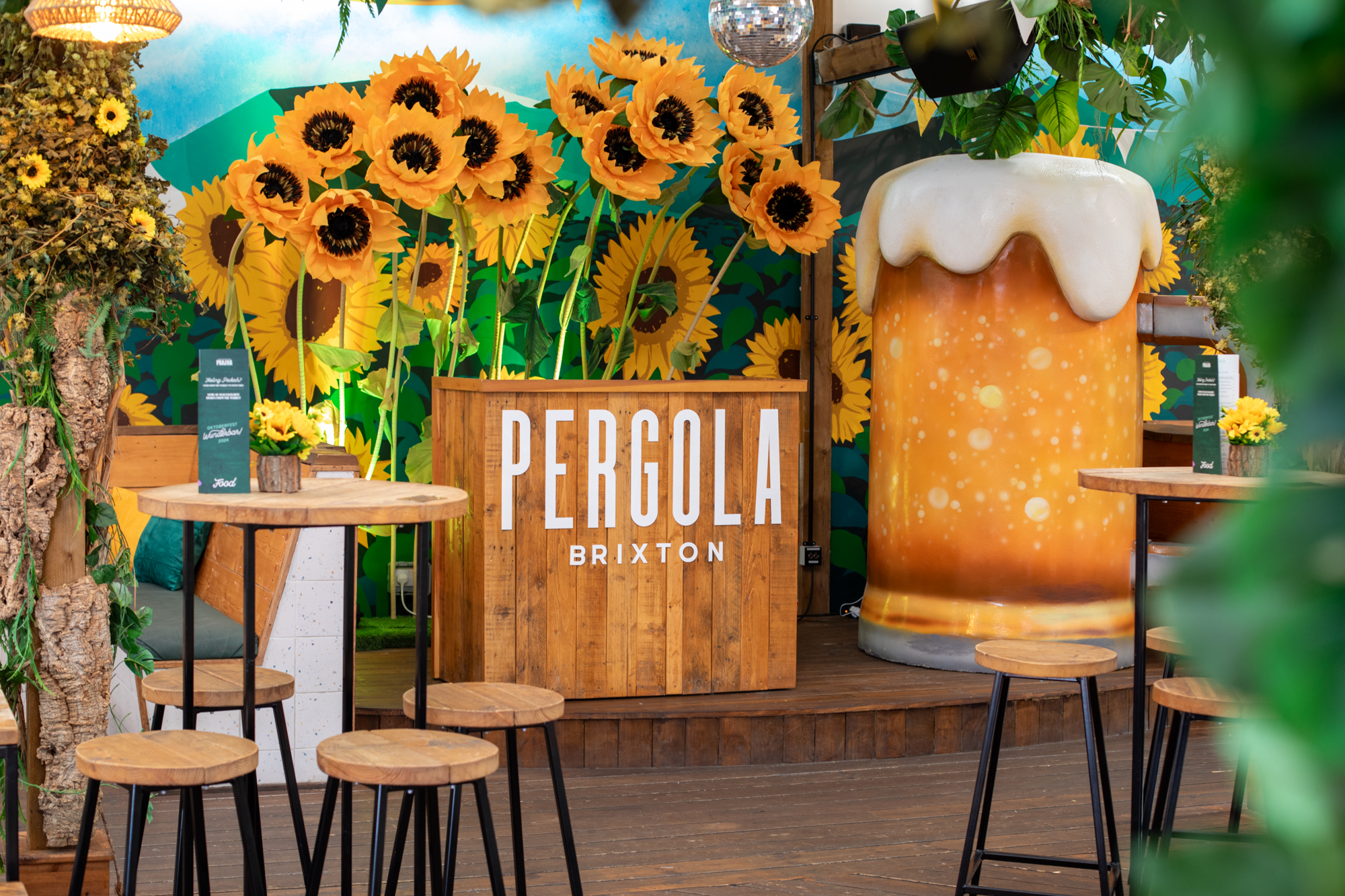 Vibrant Pergola Brixton venue with rustic bar, ideal for casual gatherings and events.