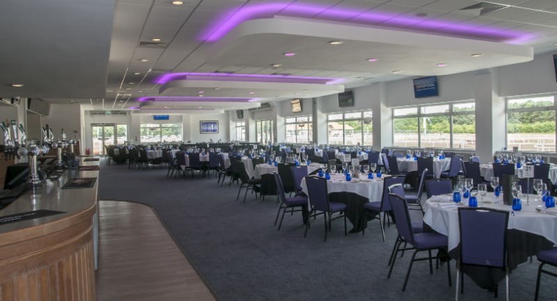 Fairwood Suite at Chelmsford Racecourse with LED lighting for corporate dinners and social galas.