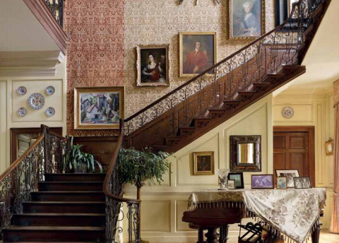 Elegant staircase at Mansion House, Hedingham Castle, ideal for upscale events and gatherings.