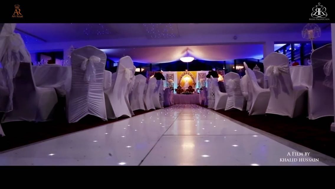 Elegant Main Hall in The Ark Royal, perfect for weddings and galas with draped chairs.