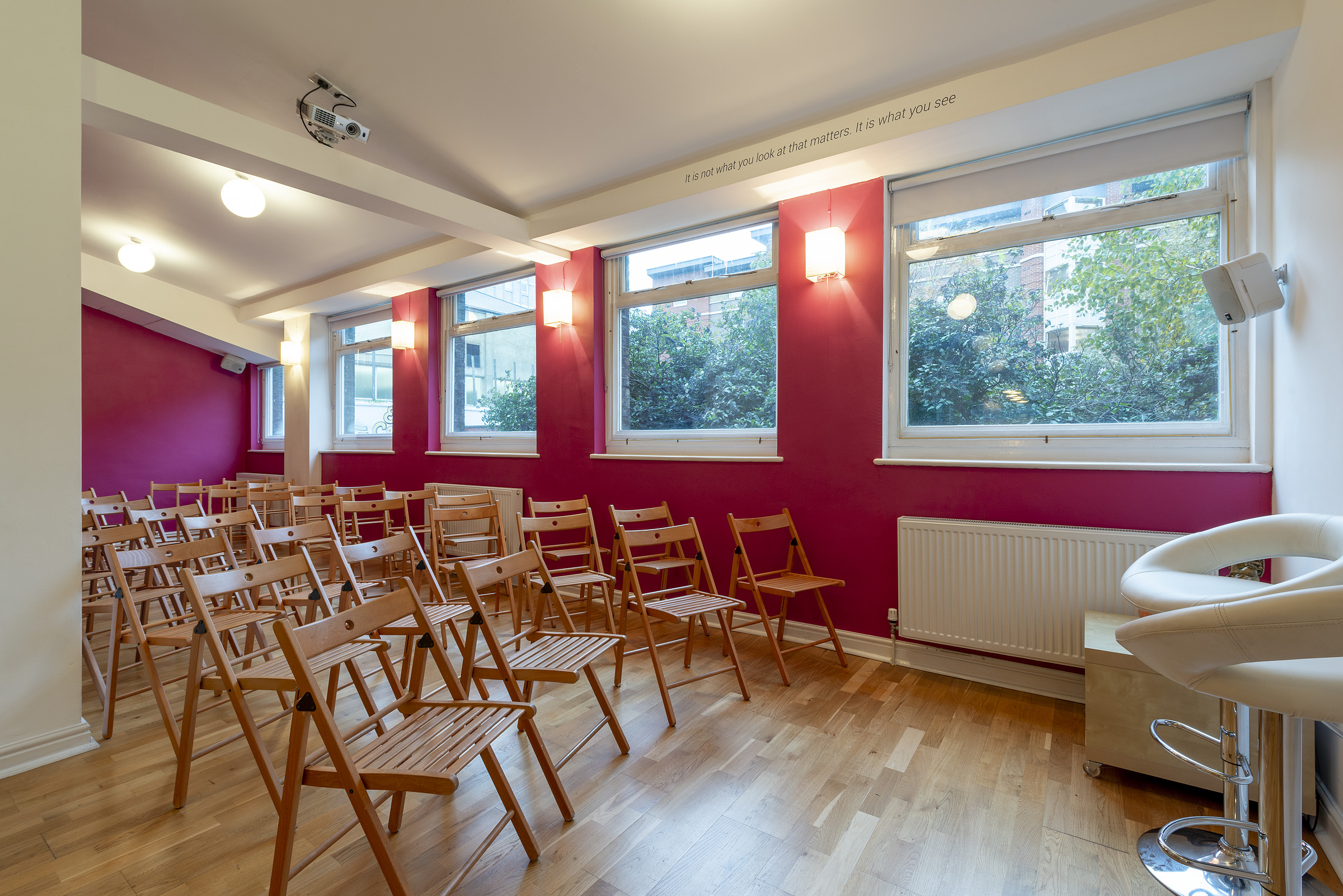 Parvati Studio at Tara Yoga Centre: vibrant meeting space for workshops and presentations.