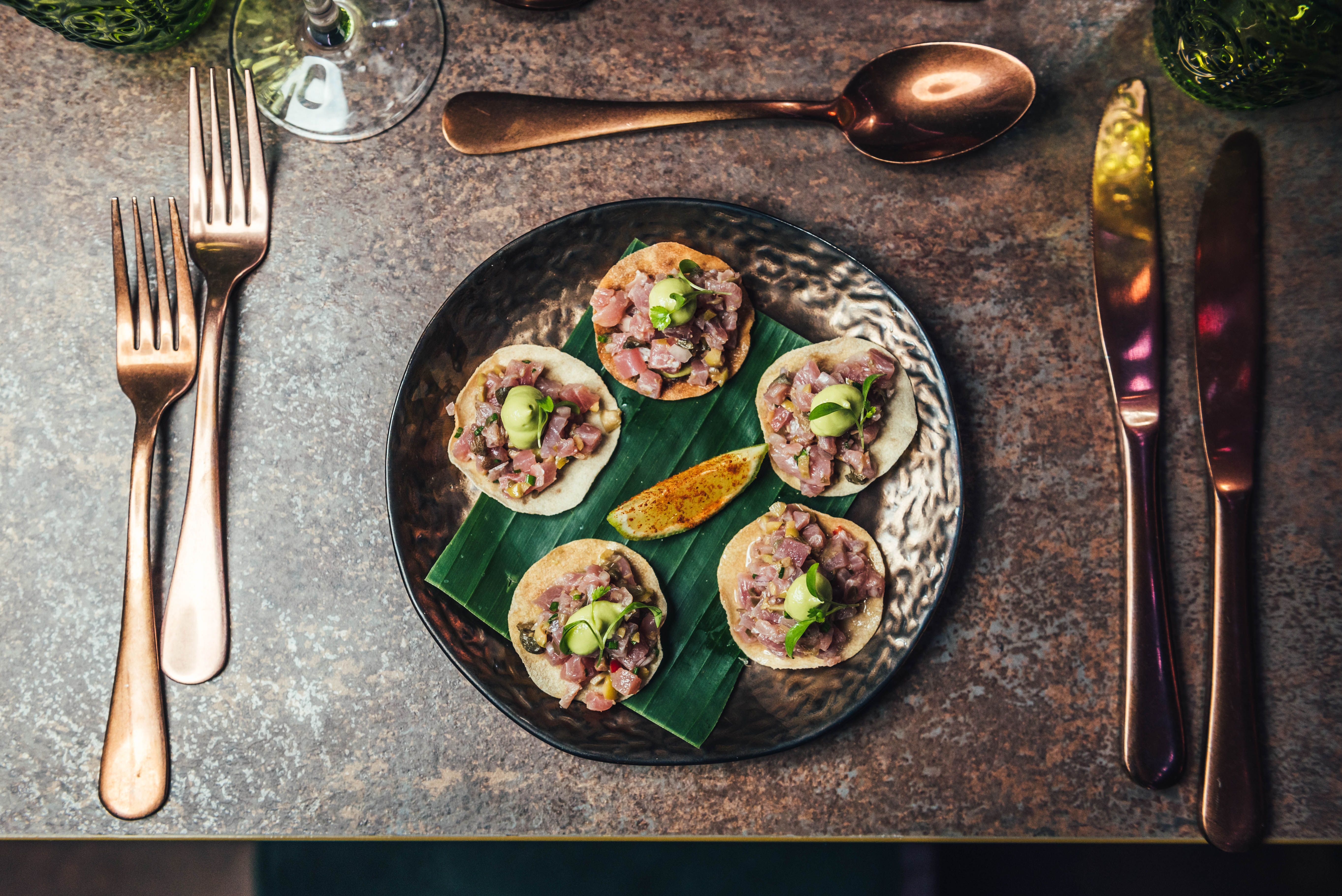 Elegant gourmet appetizers in Jako London's lounge area for upscale events.