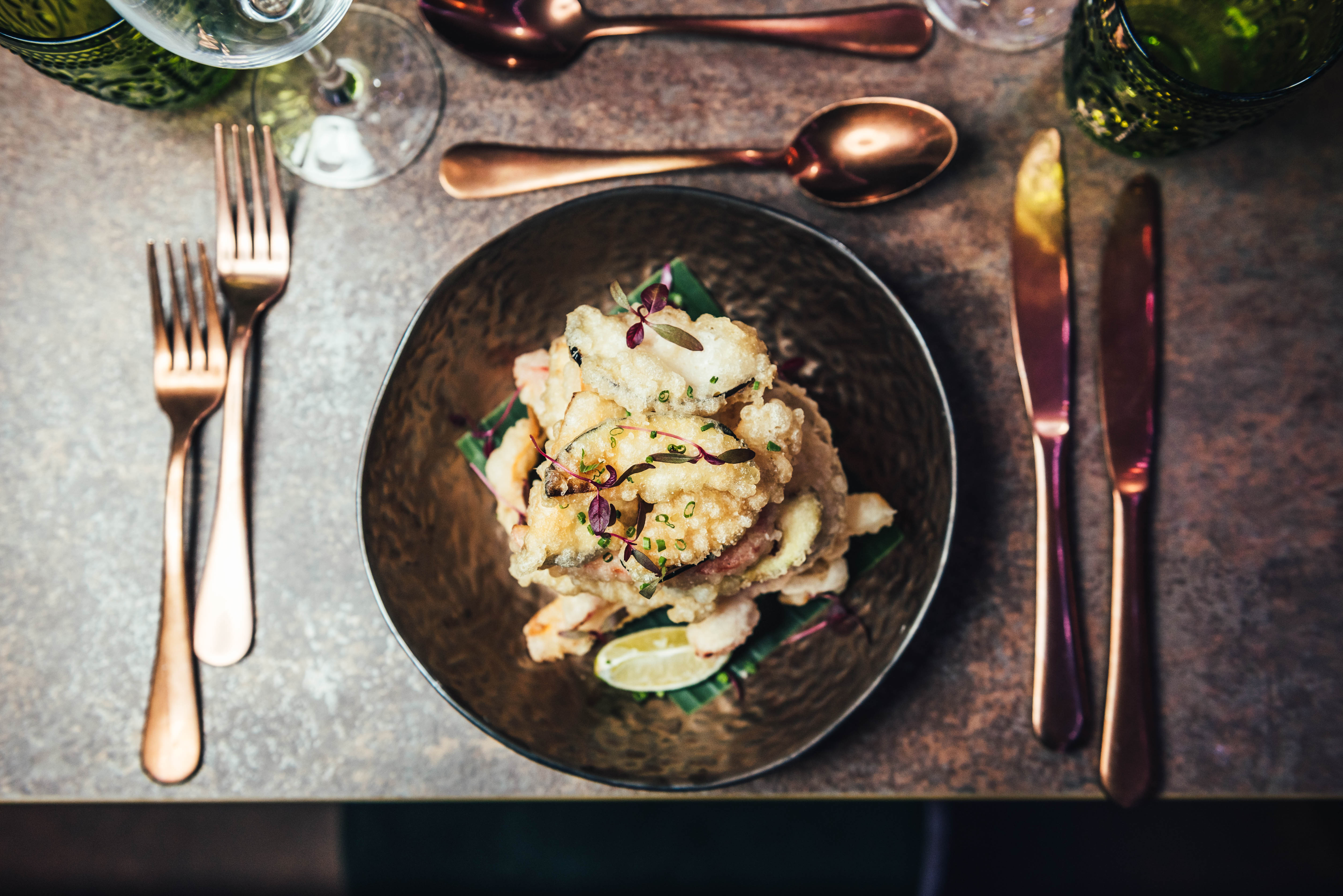 Elegant plated dish in Jako London lounge, perfect for upscale corporate events and weddings.