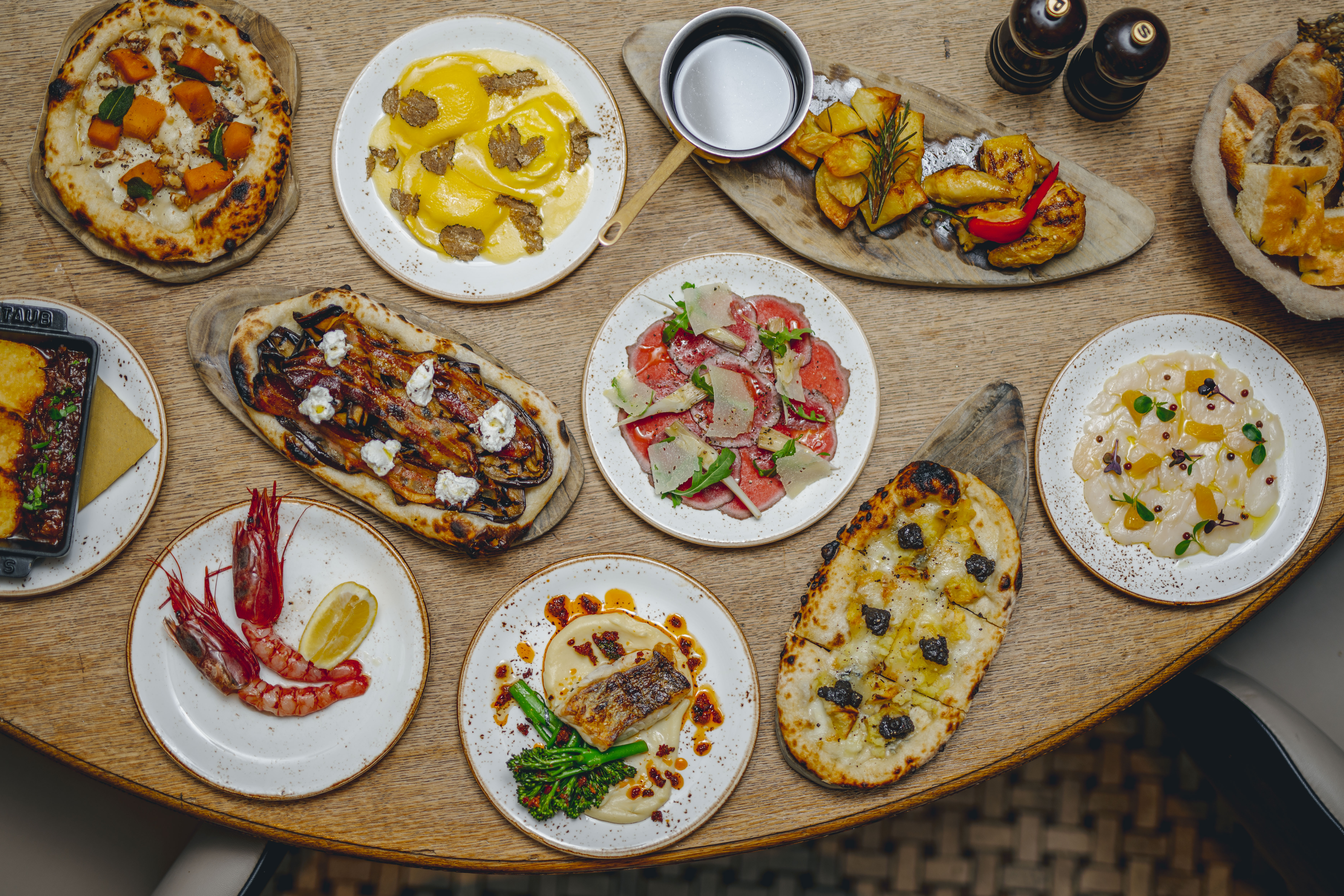 Exclusive Venue Hire at TOZI Restaurant: colorful dishes for upscale catered events.