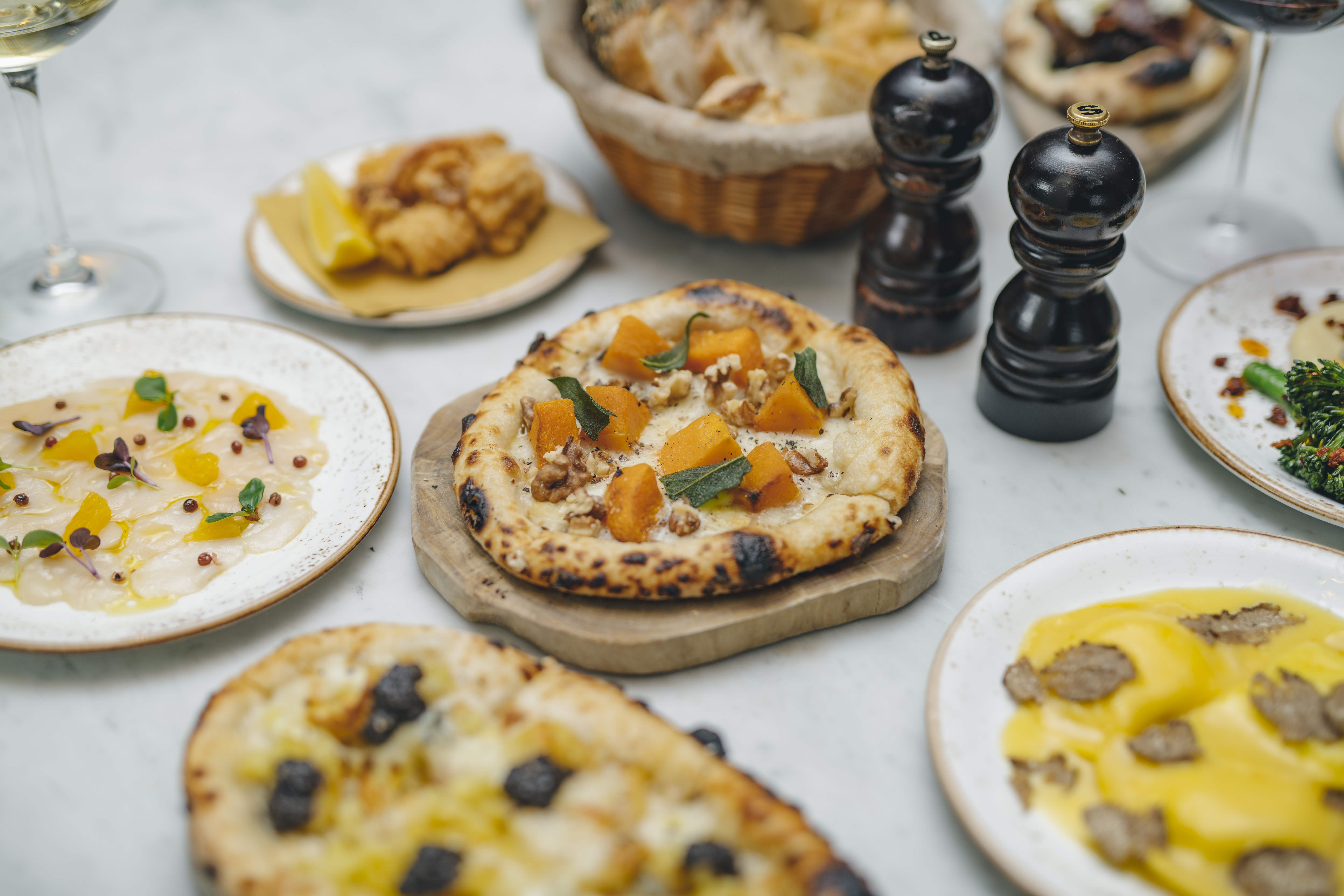 Gourmet dishes at TOZI Restaurant & Bar for upscale event venue hire.