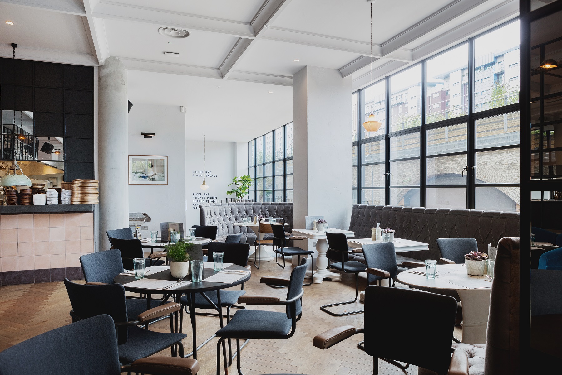 Modern venue with large windows for intimate meetings and events at No.29 Power Station West.