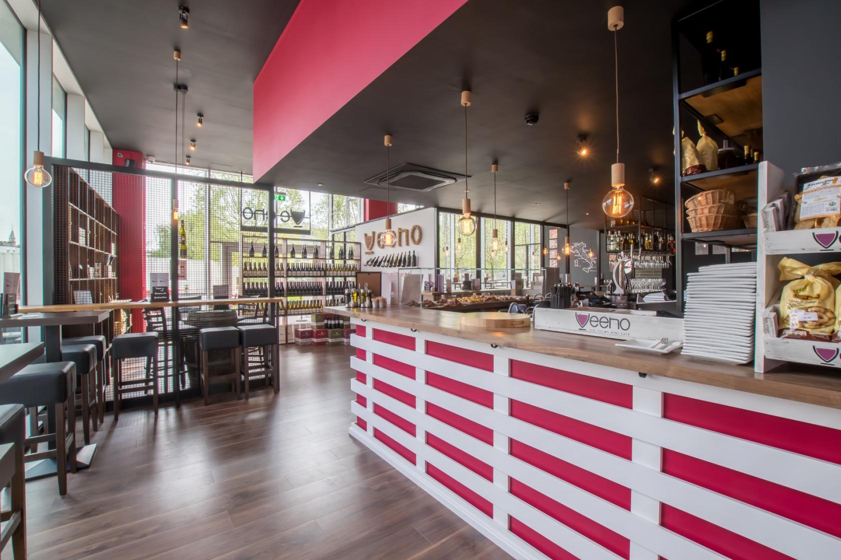 Modern venue with vibrant decor at Veeno Italian Wine Bar, perfect for events and gatherings.