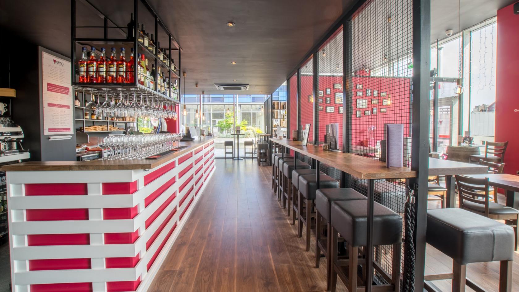 Modern bar area in Veeno Bristol, perfect for networking events and cocktail receptions.