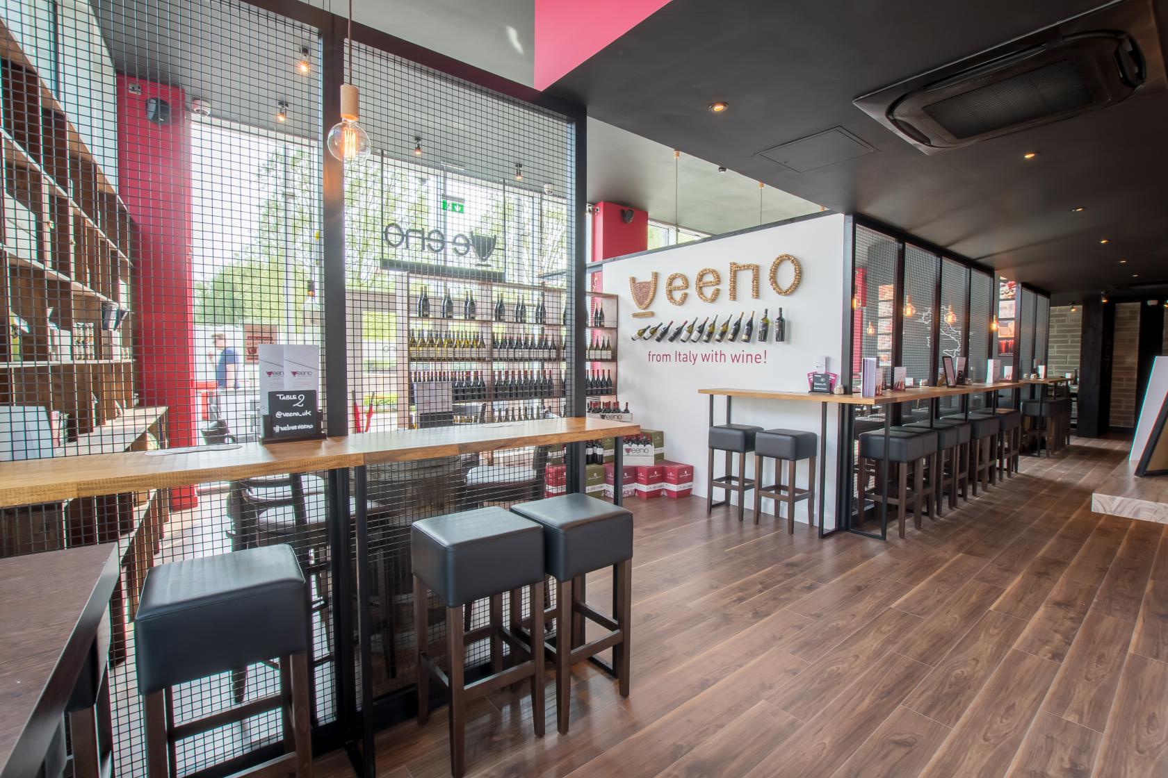 Modern venue with high-top seating for intimate gatherings in Veeno Bristol.