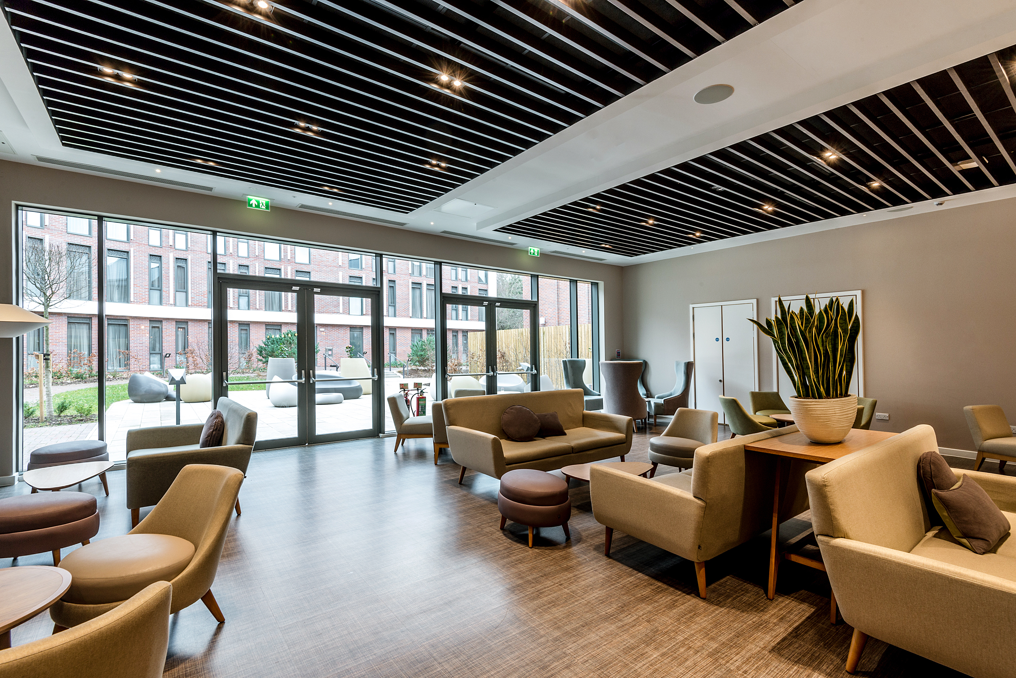 Modern lounge in Fry Suite, Edgbaston Park Hotel for networking events and meetings.