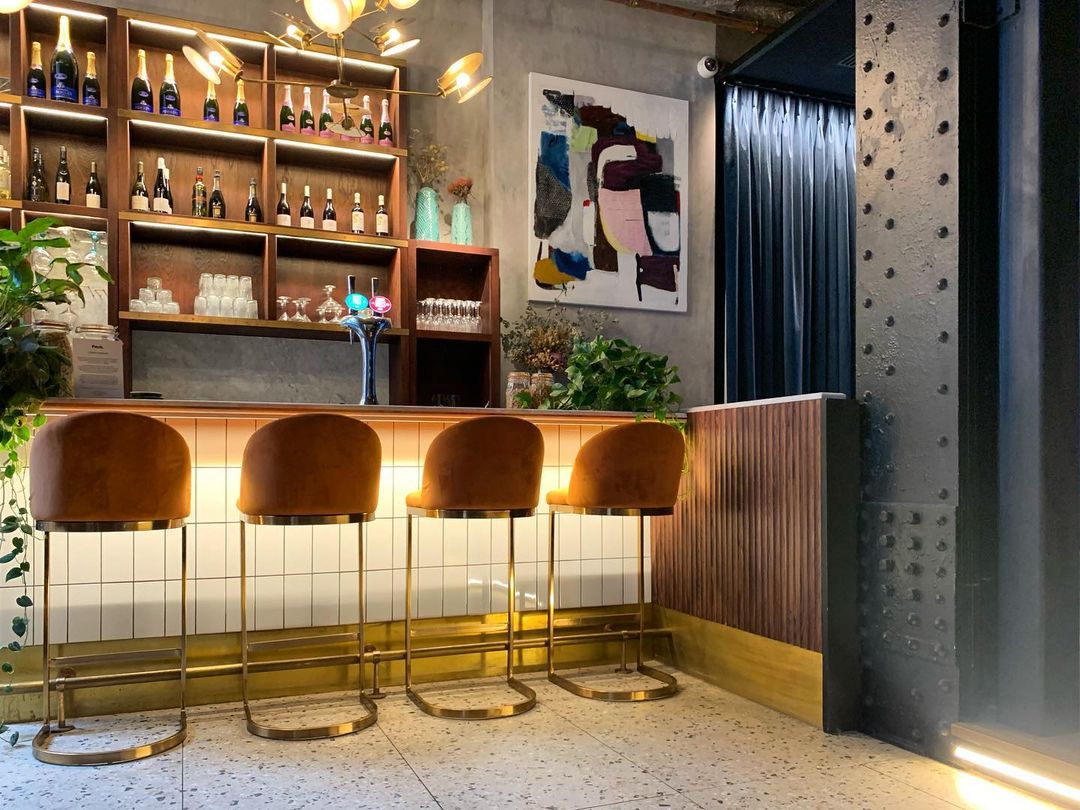 Stylish bar area at Exclusive Venue, perfect for networking events and gatherings.