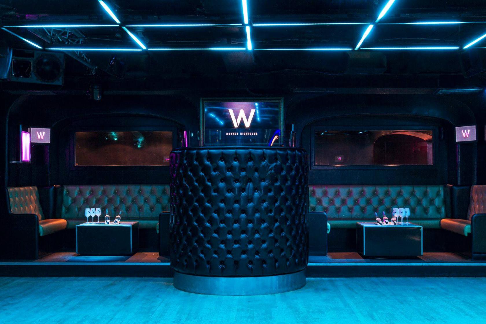 Whole Venue at Why Not Nightclub: modern event space with stylish seating for upscale gatherings.