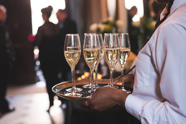 Elegant dining room at York Mansion House with champagne flutes for networking events.