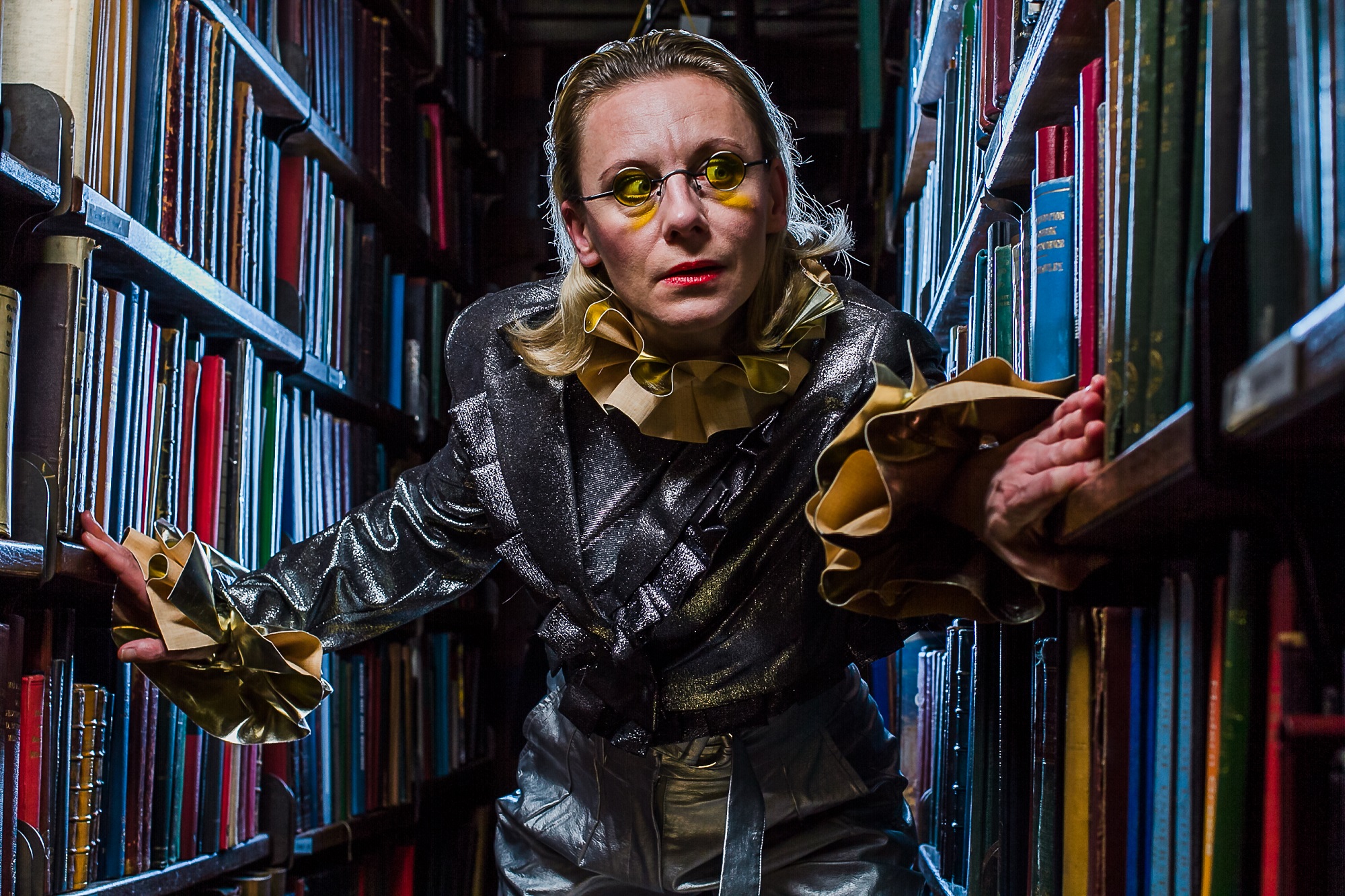 Creative individual in The London Library, inspiring unique event themes and engagement.