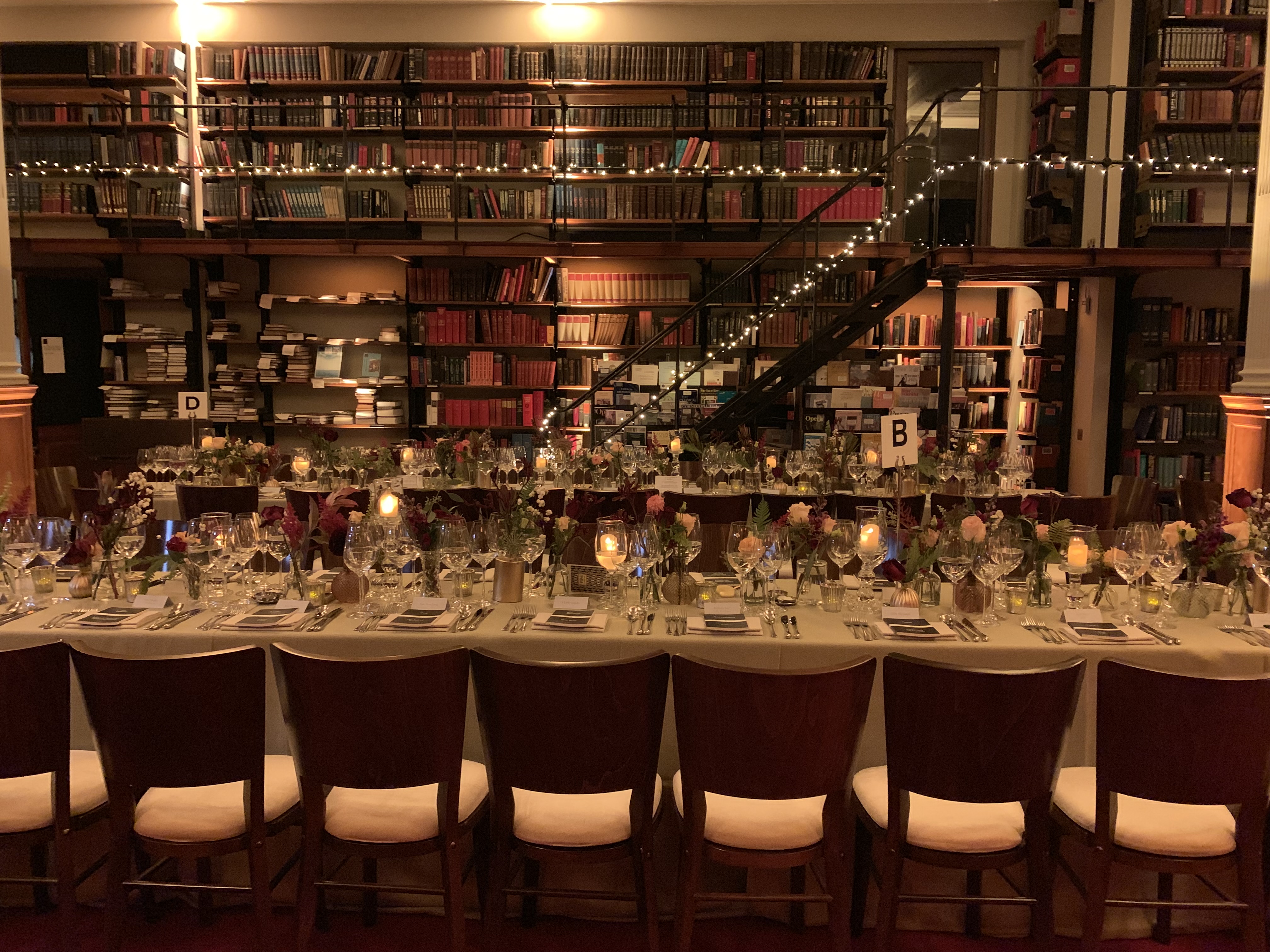 Elegant dining setup in The London Library for corporate dinners and private events.