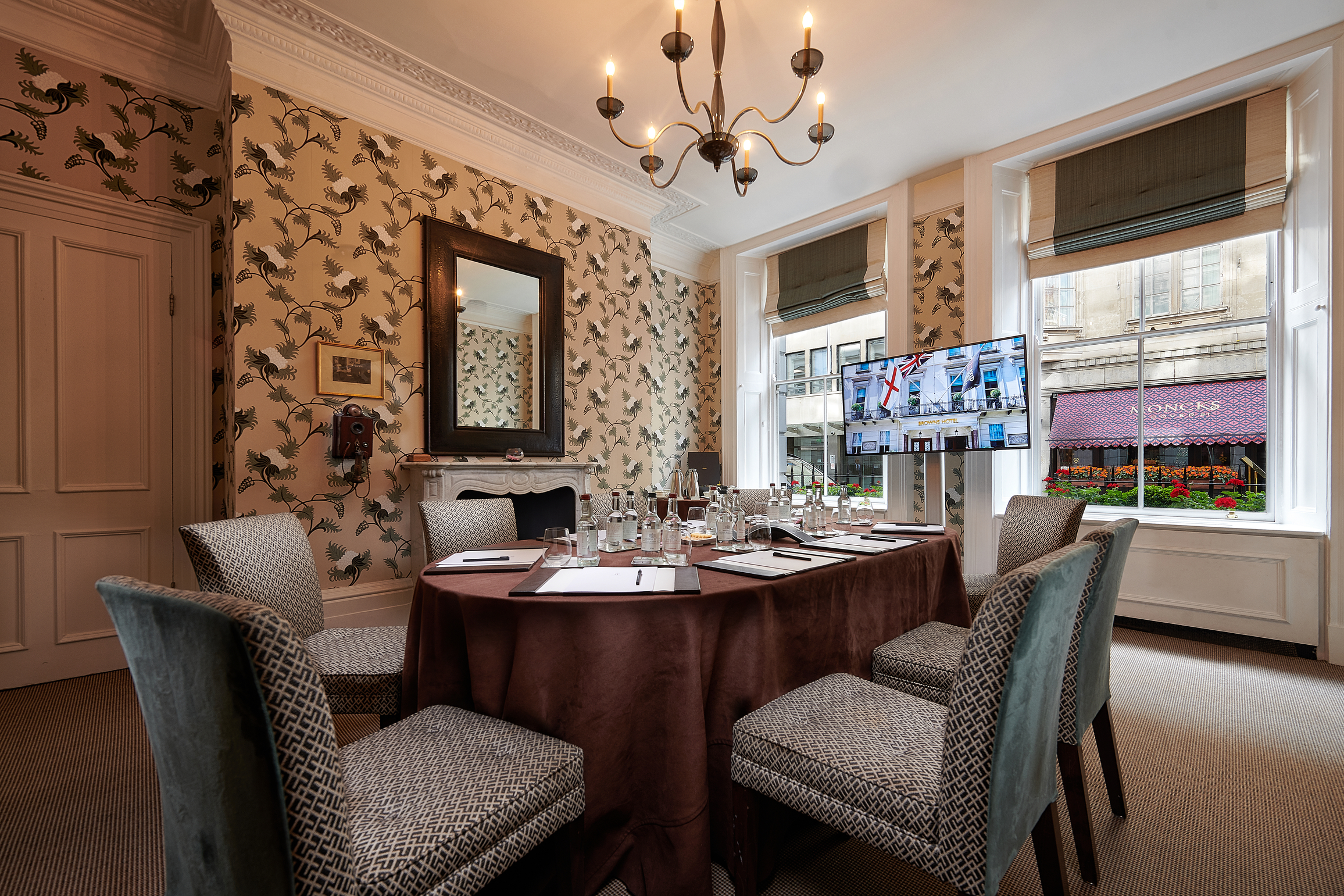 Graham Bell in a sophisticated meeting room at Brown's Hotel, perfect for small events.
