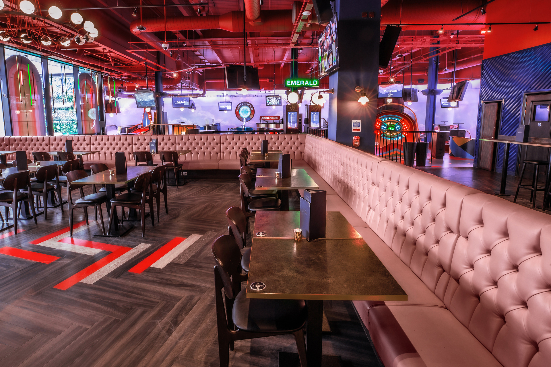 Vibrant event space at Puttshack Lakeside for corporate functions and celebrations.