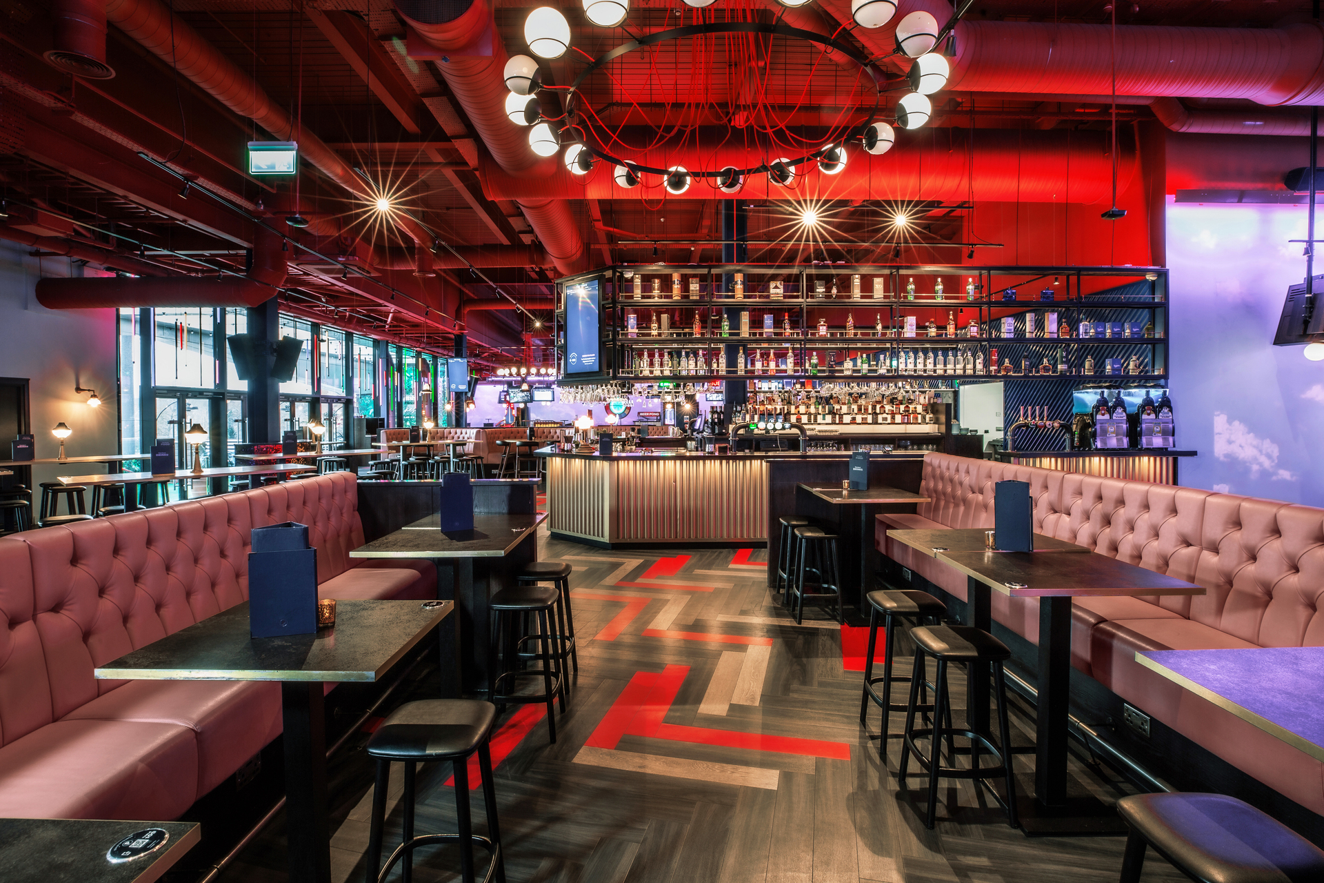 Modern event venue with vibrant decor for networking and social functions at Puttshack Lakeside.