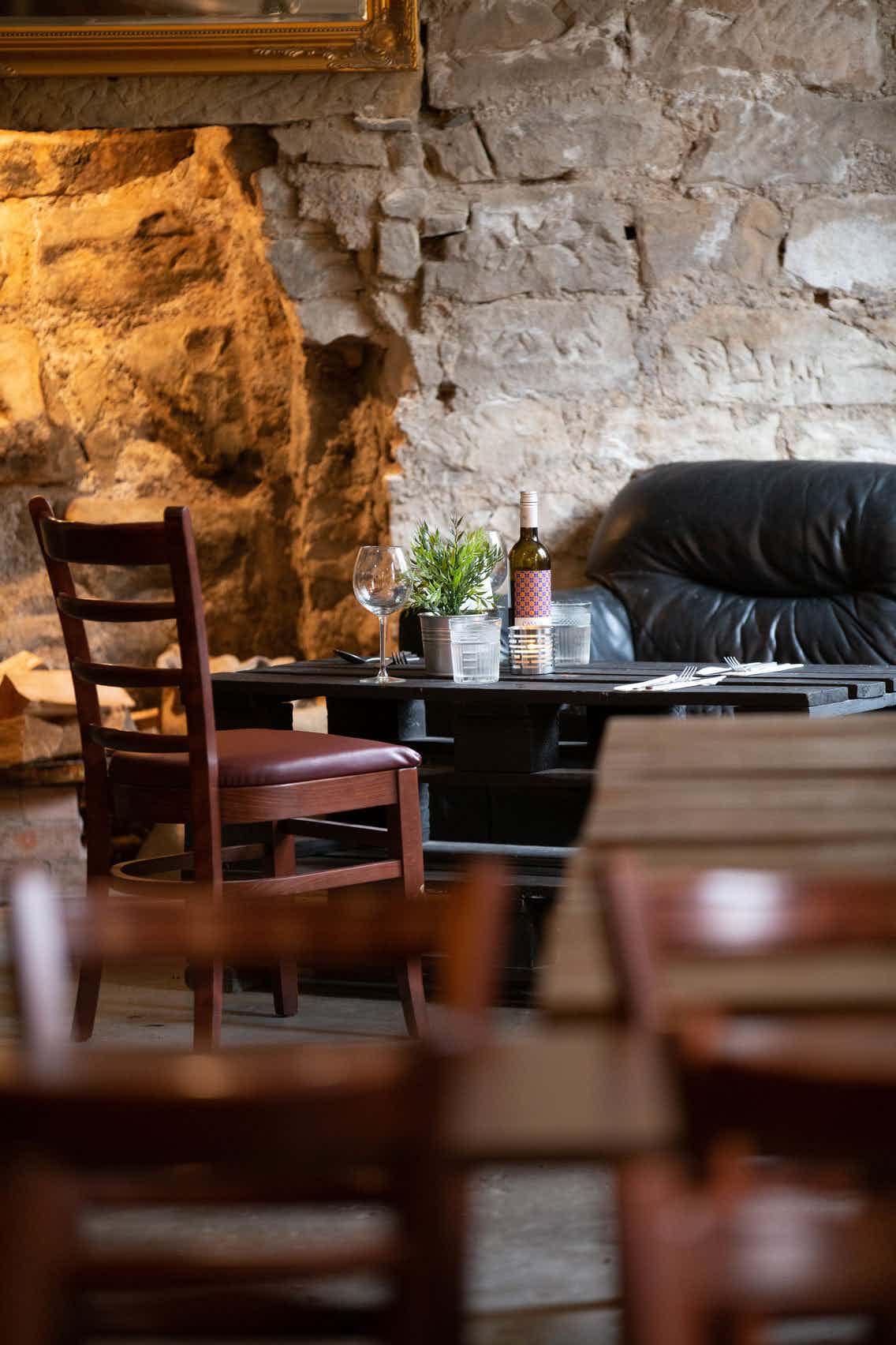 Cozy private venue with rustic decor, ideal for small meetings and events.