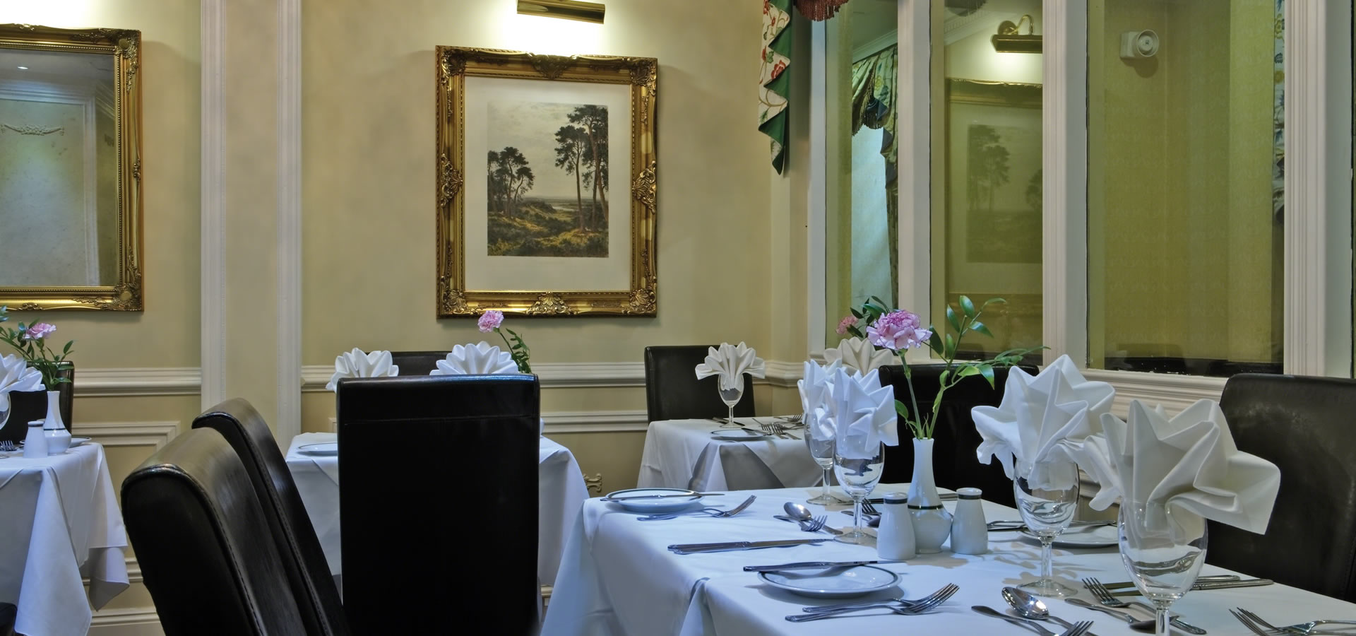 Elegant dining table in Syndicate Room, Fitzrovia Hotel for upscale events and dinners.