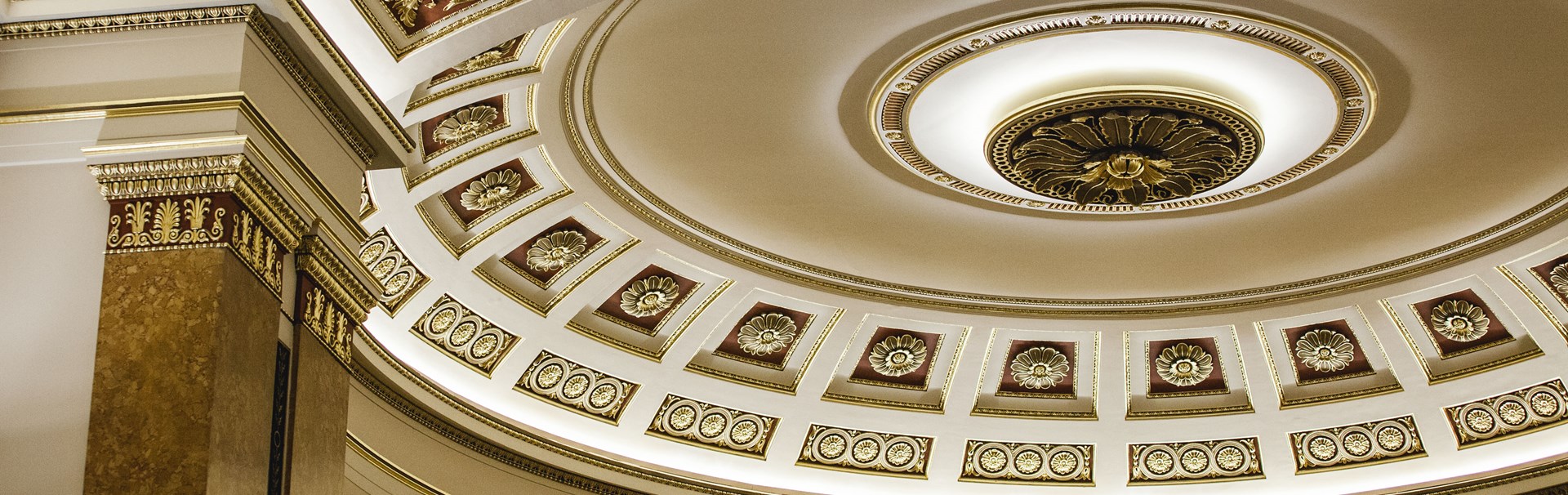Elegant ballroom ceiling with ornate molding at The Lansdowne Club for formal events.