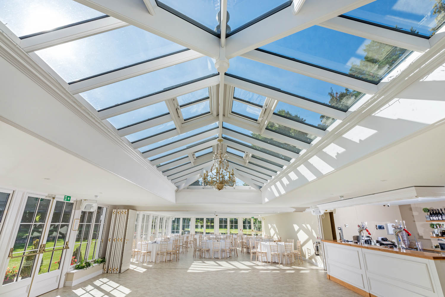 The Orangery at Hayne House: elegant glass ceiling venue for weddings and events.