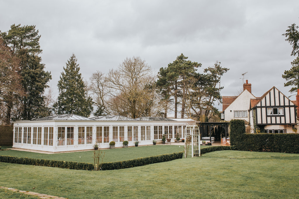 Orangery at Hayne House: spacious conservatory for events, natural light, and greenery.