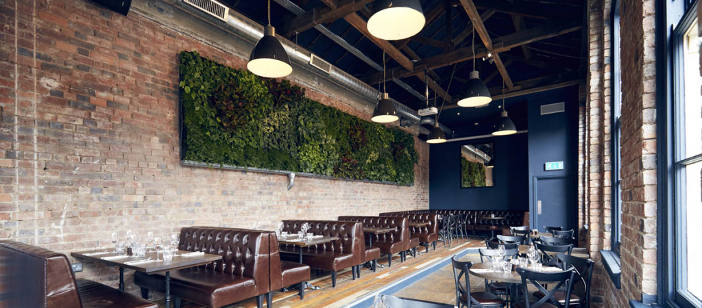 Stylish Button Factory venue with exposed brick, ideal for networking and upscale events.