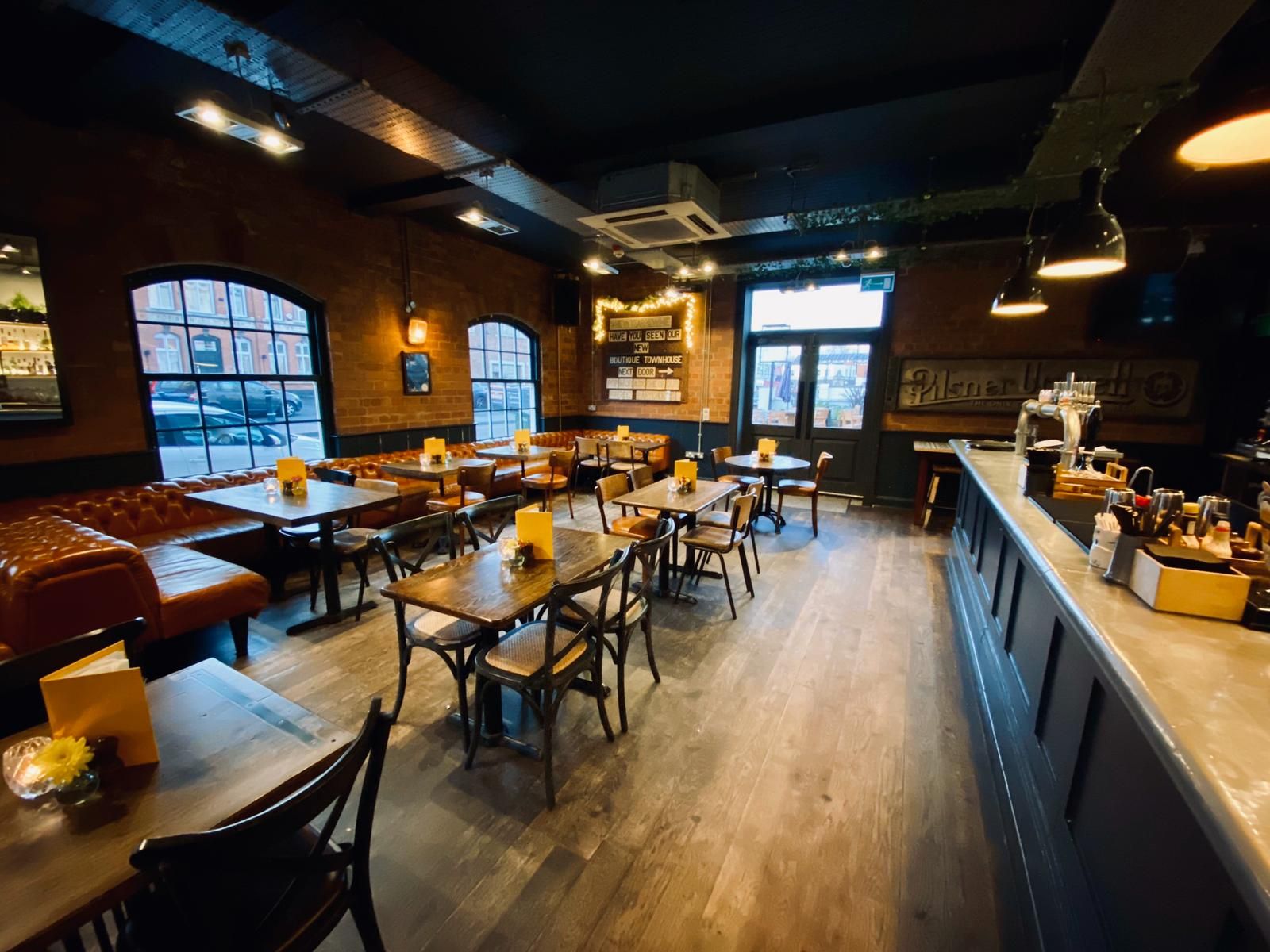 Versatile event space at The Button Factory with natural light for meetings and gatherings.