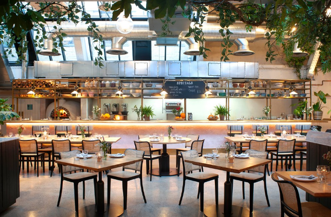 Modern venue with open kitchen, ideal for events and gatherings at Wild by Tart.