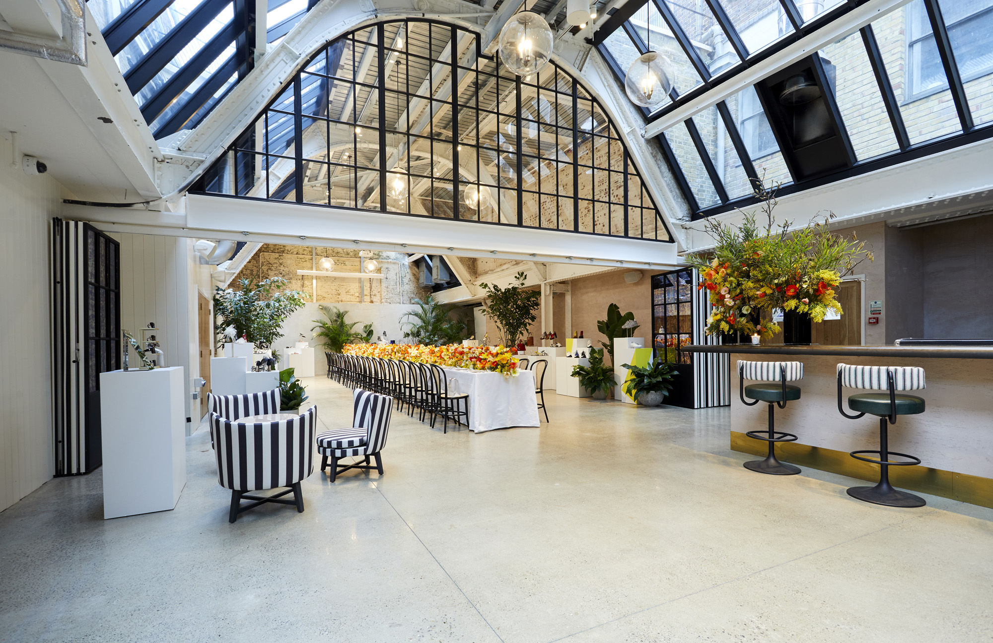 Exclusive hire venue with high ceilings, ideal for corporate events and formal dining.