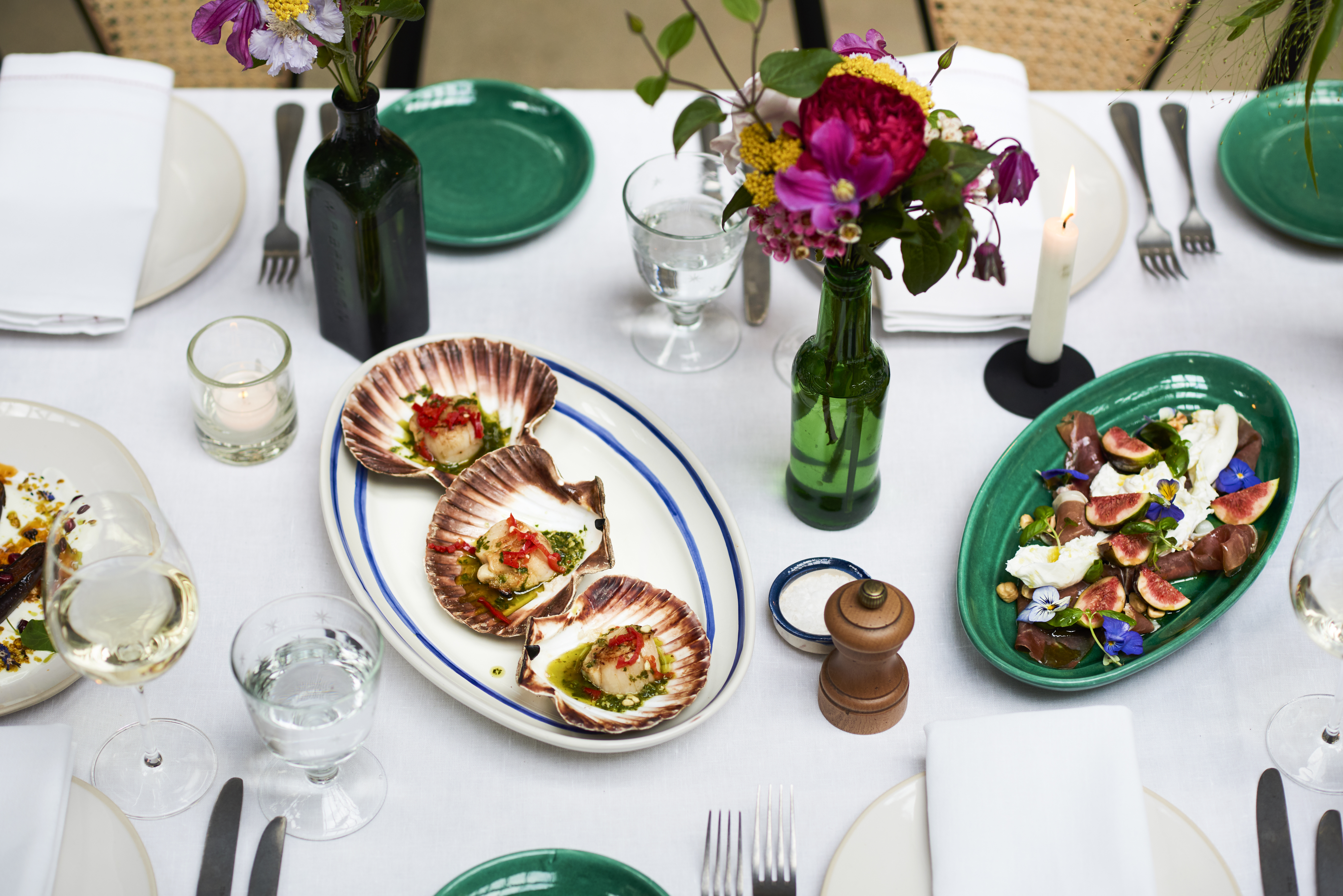 Elegant dining table setup for upscale events at Wild by Tart, featuring gourmet cuisine.