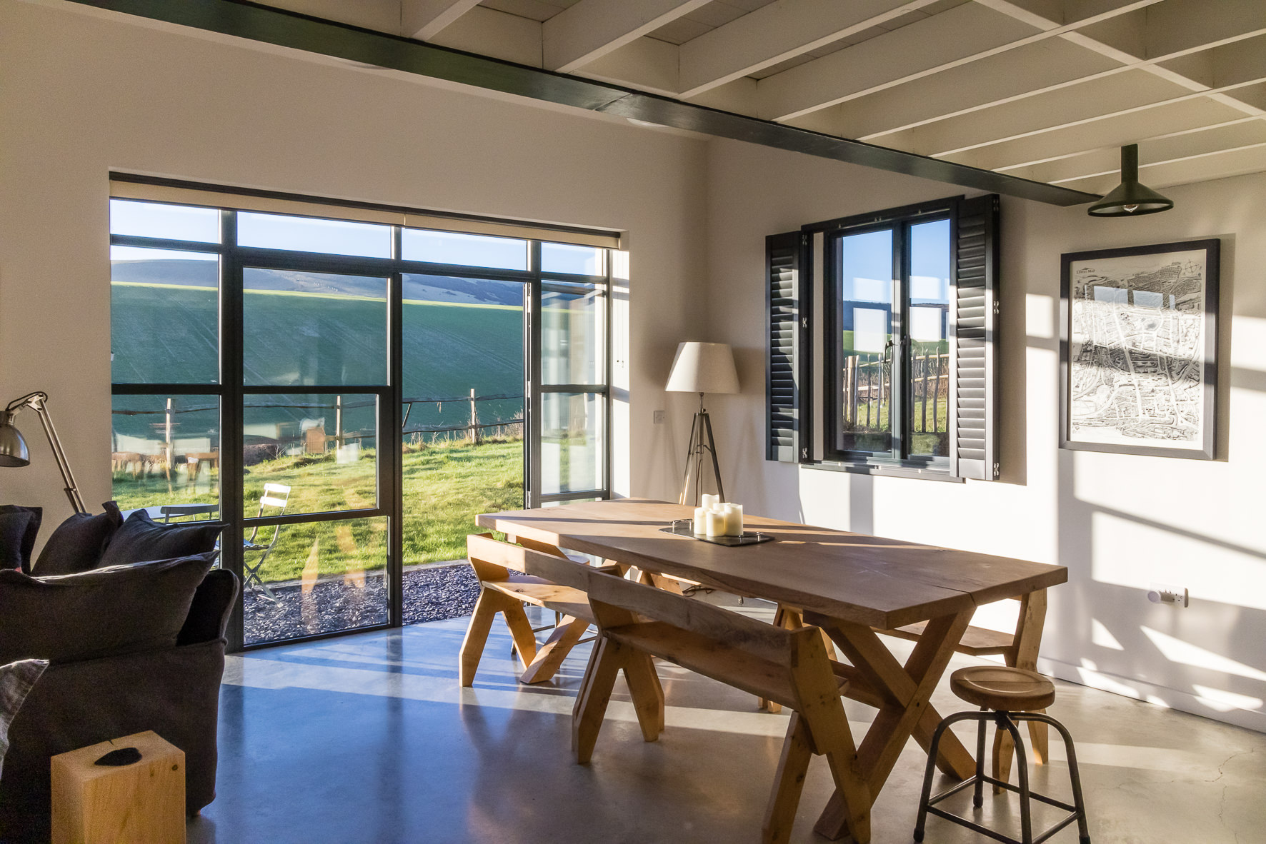 Modern meeting space in The Grain Store Lewes with large windows for events.