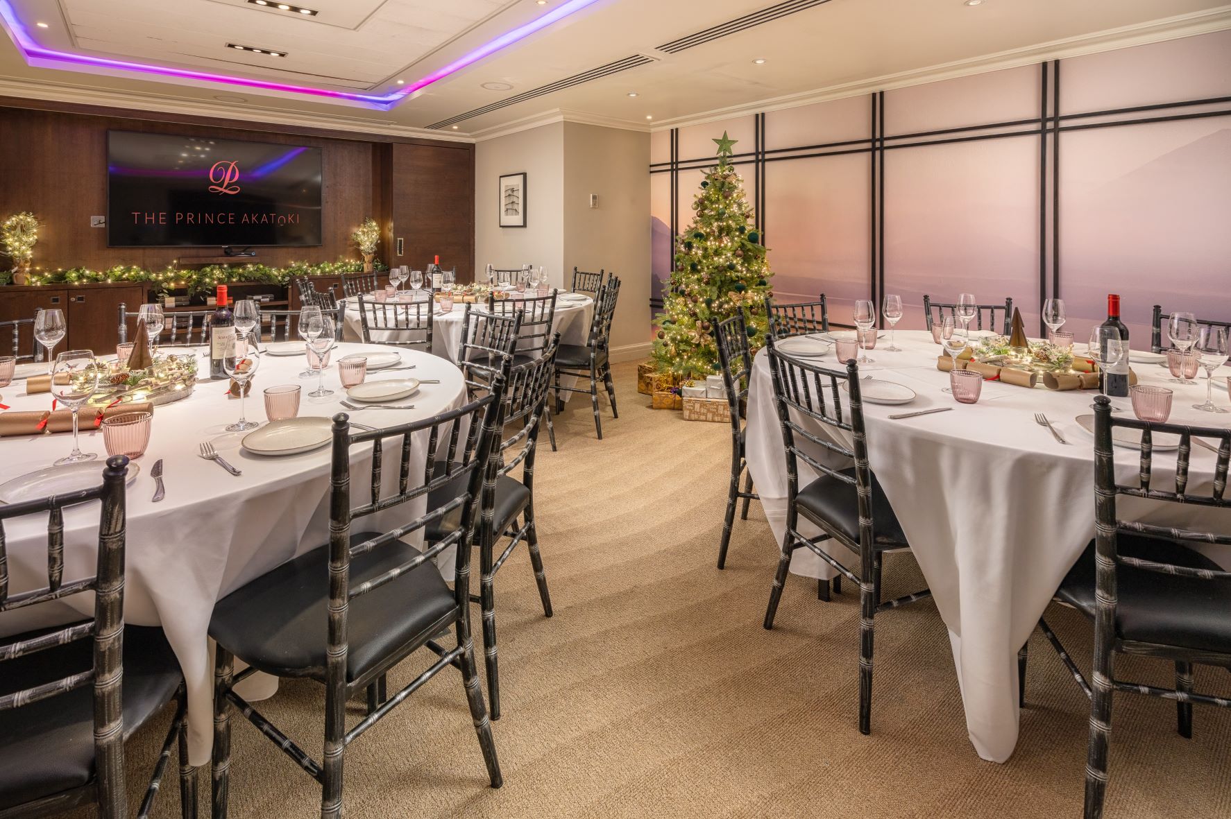 Elegant event space in The Prince Room, ideal for corporate meetings and holiday gatherings.