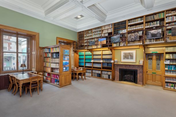 Lecture Theatre & Lower Library, warm wood tones, ideal for workshops and meetings.