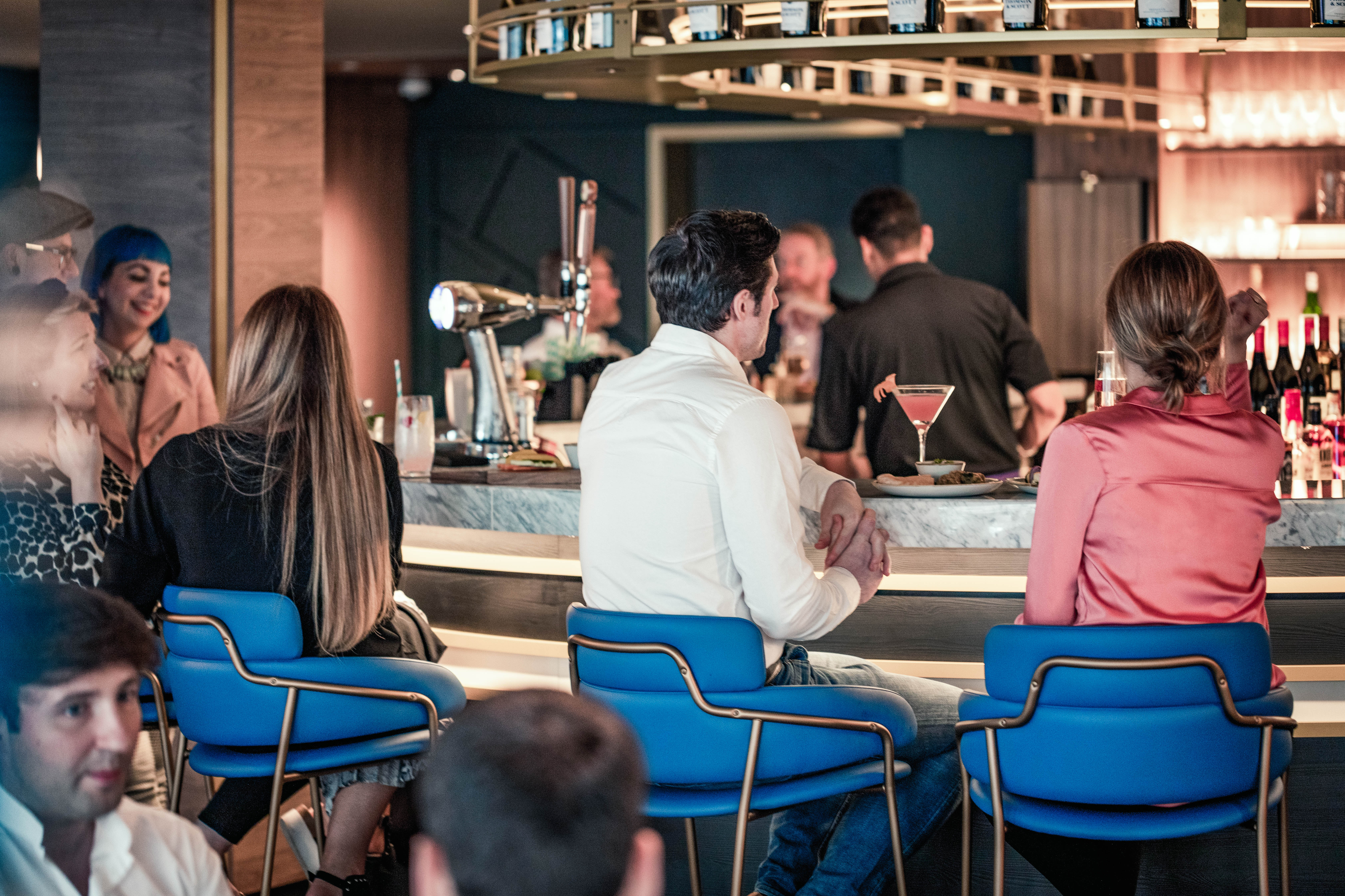 Imaginex 360° Screening room at YOTEL Edinburgh, vibrant bar for networking events.