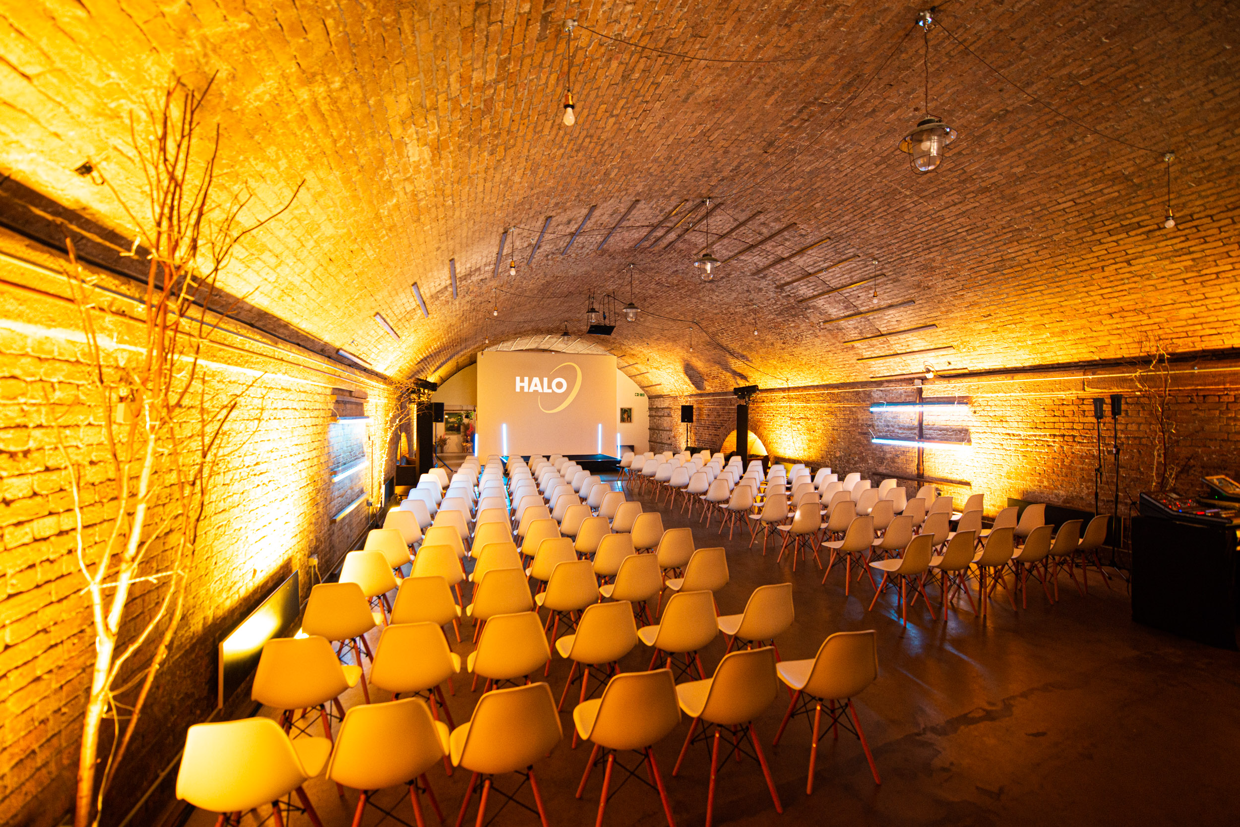 Stylish event space with modern chairs, ideal for corporate meetings and workshops.