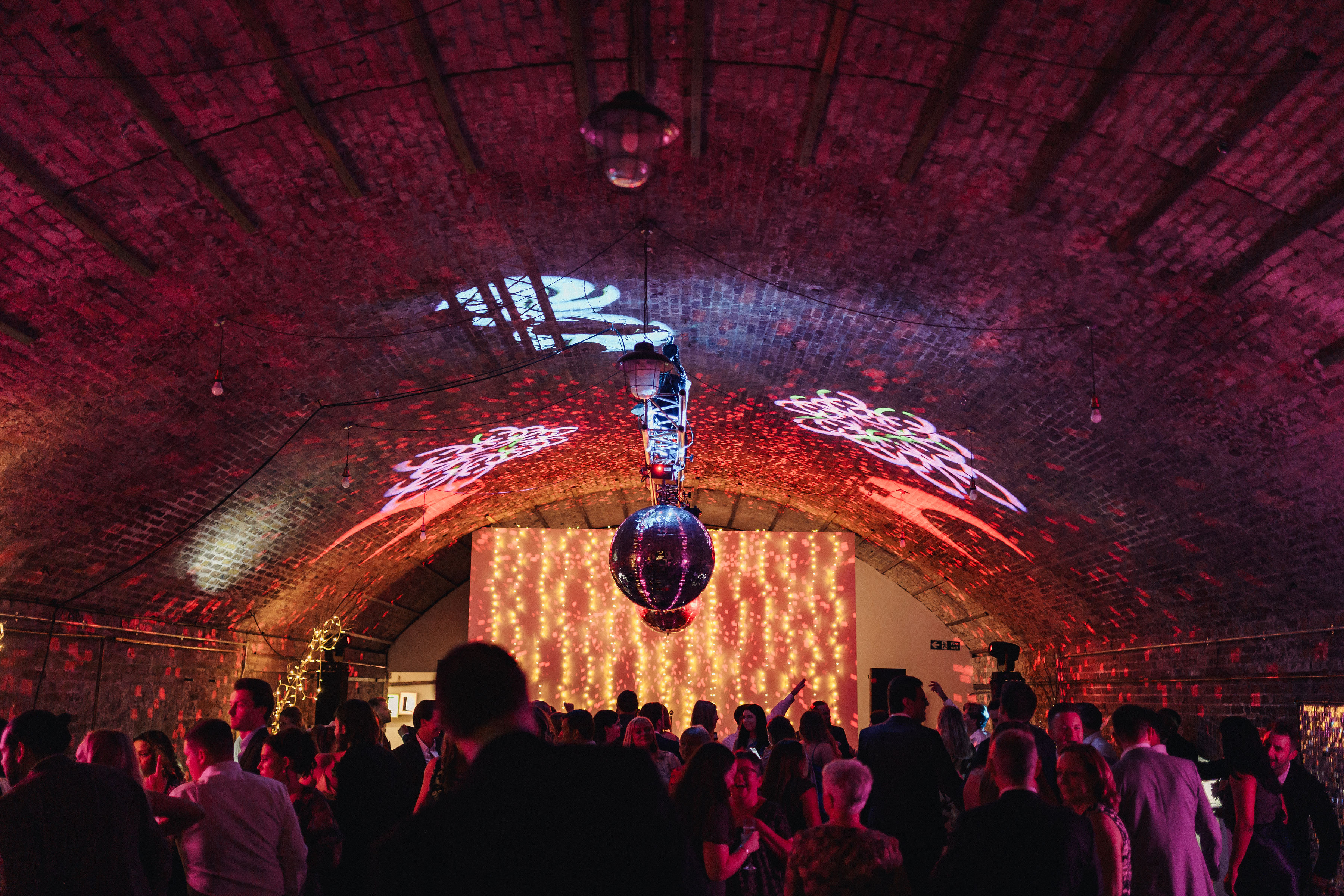 Vibrant event space with disco ball, ideal for themed parties and celebrations.