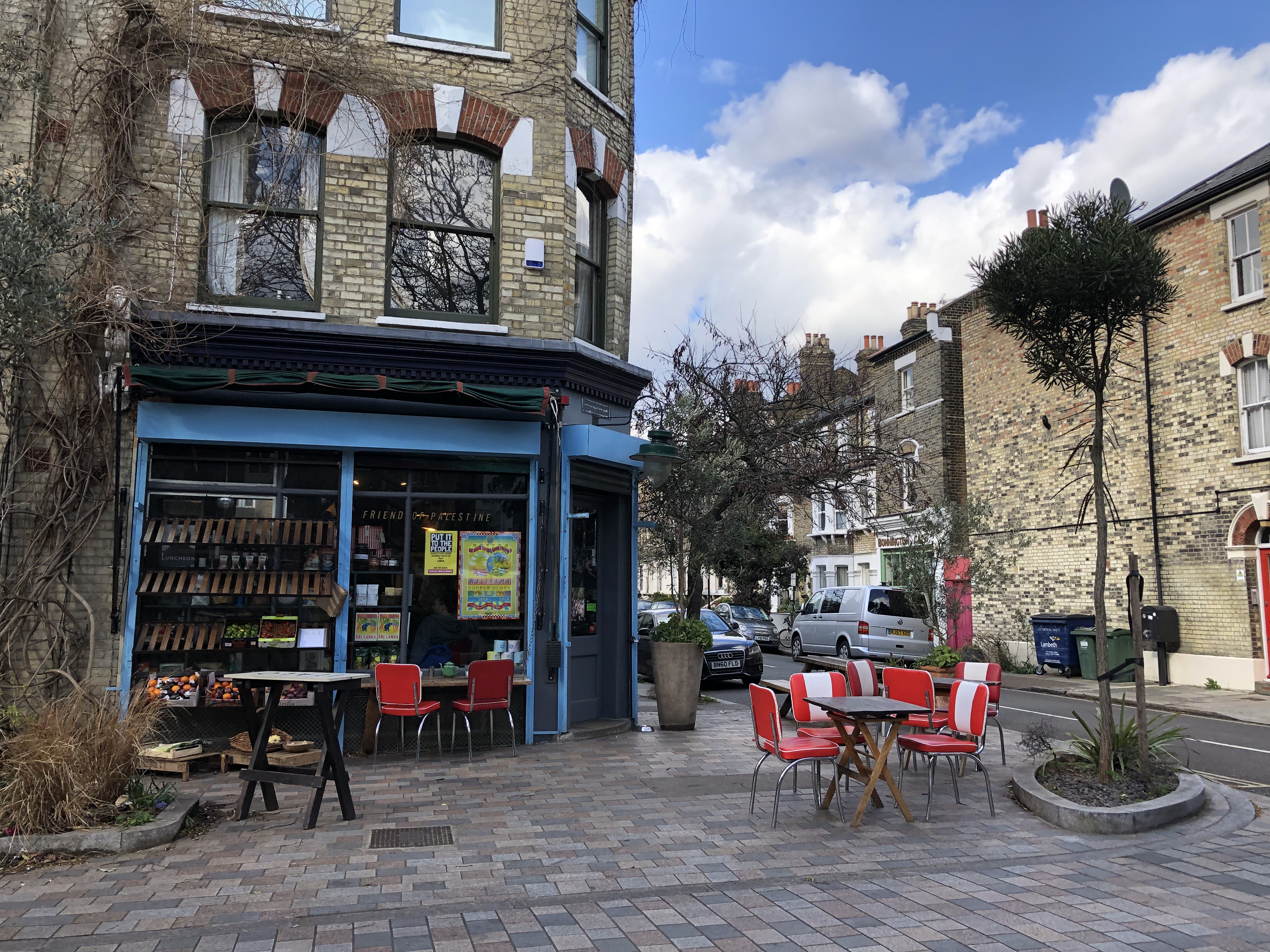 Charming outdoor venue at Italo Delicatessen for casual meetings and networking events.