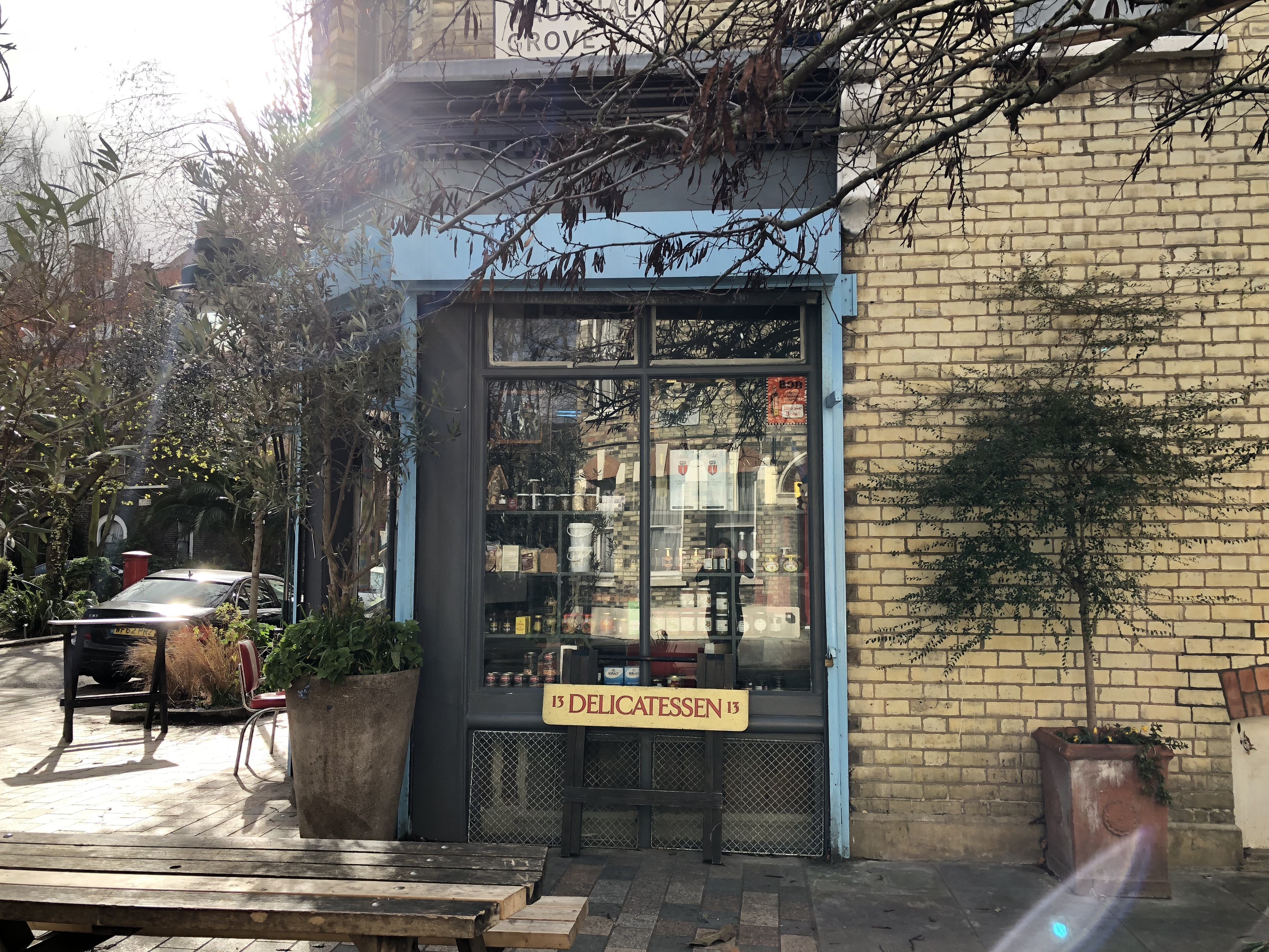 Charming Italo Delicatessen venue with outdoor seating for intimate gatherings and events.