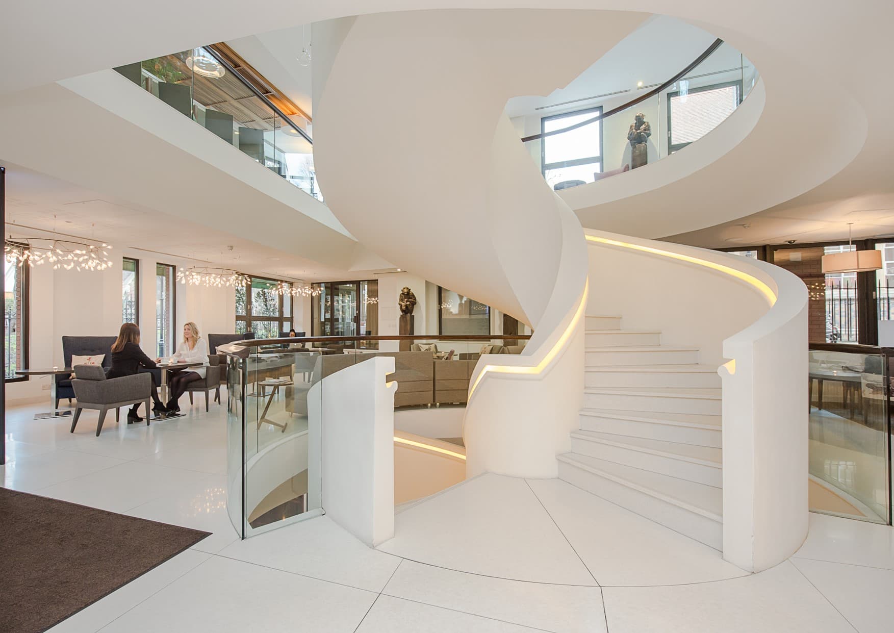 Grand staircase in Pavilion Kensington event foyer for luxury corporate networking venues.