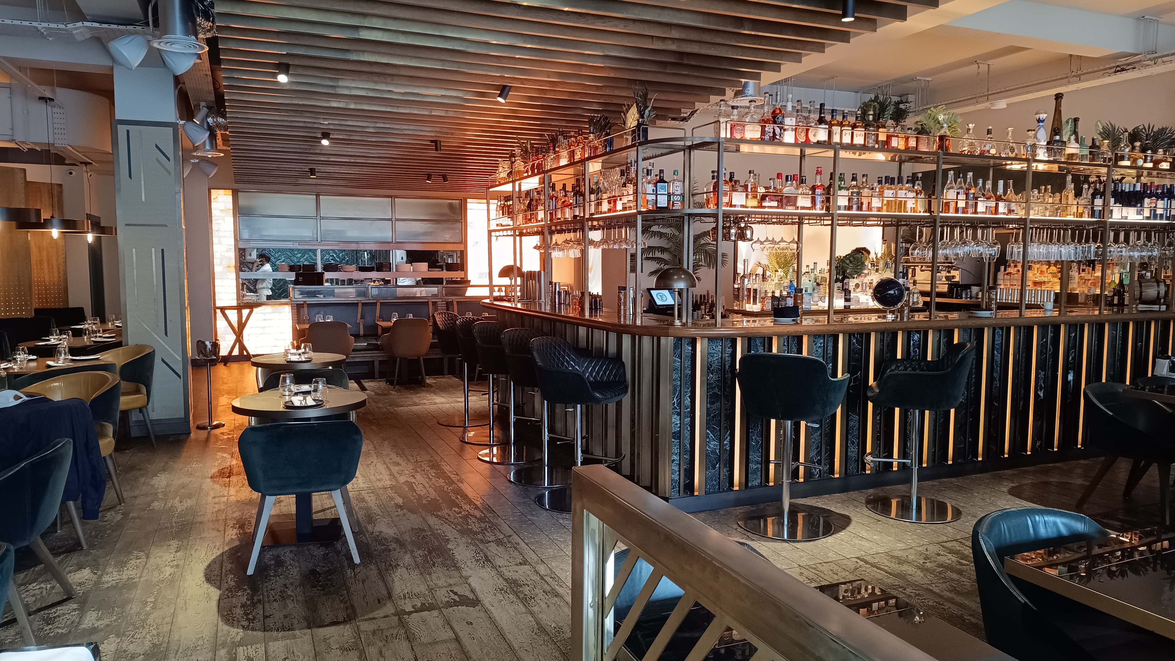 Stylish bar area in Farzi London, perfect for networking events and casual meetings.