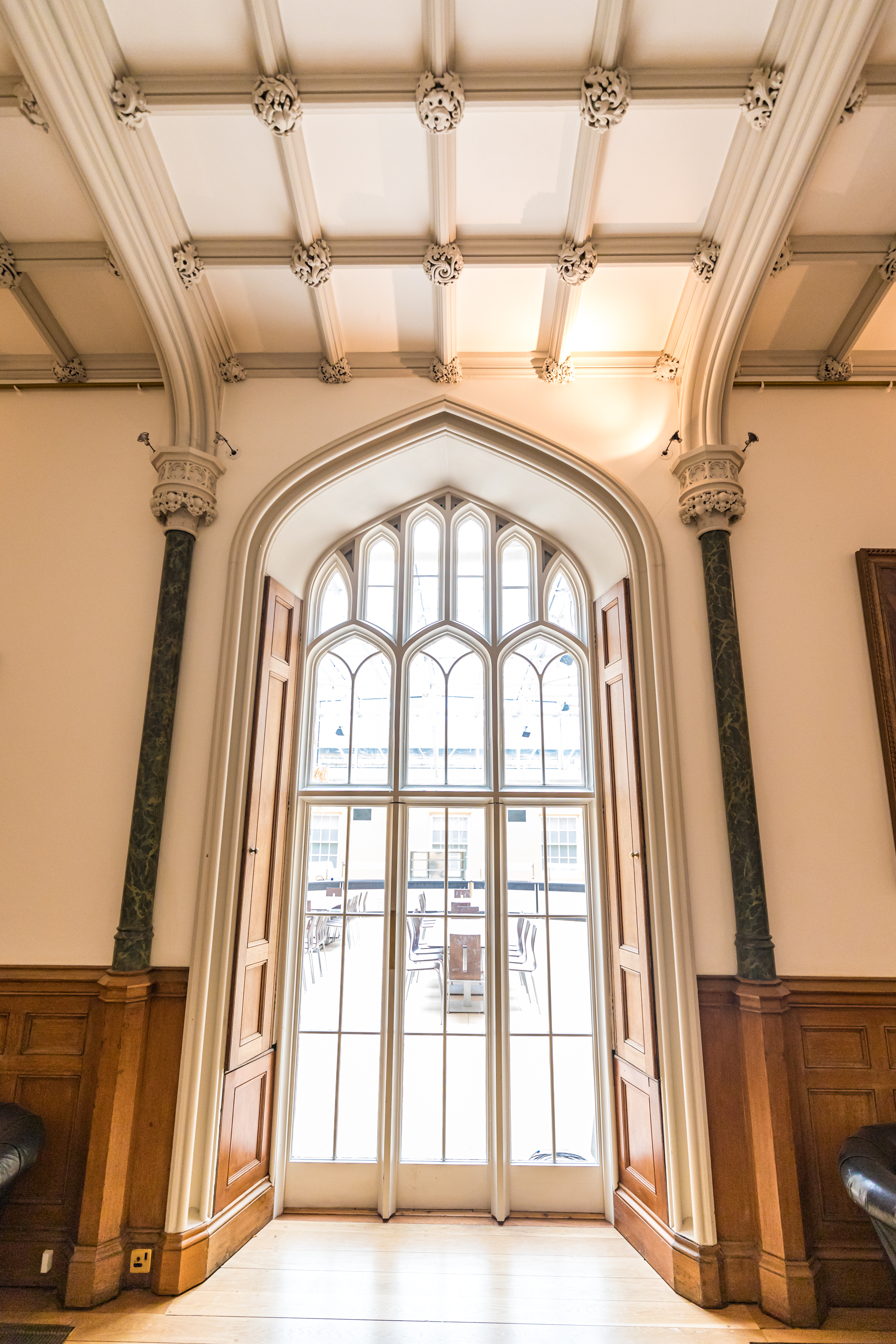 Ditton Manor House arched window, elegant venue for formal events and gatherings.