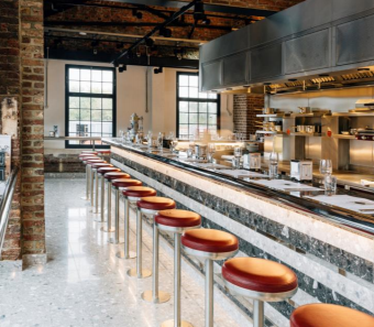 Private dining room at Barrafina Coal Drops Yard with modern bar, ideal for networking events.