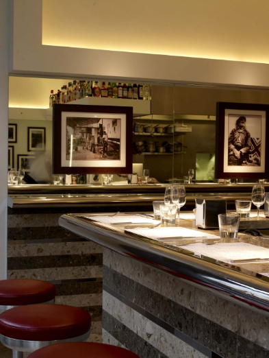 Private dining room at Barrafina Dean Street, elegant table setting for intimate events.
