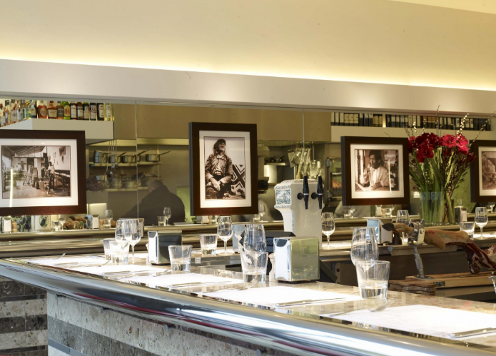 Private dining room at Barrafina Dean Street, elegant bar, ideal for upscale events.