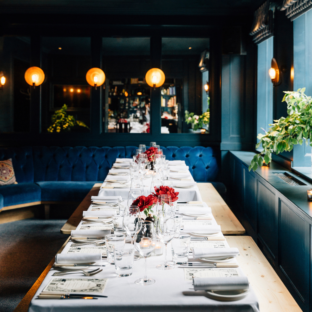 Elegant dining setup in The Blue Room, Quo Vadis for intimate events and corporate dinners.